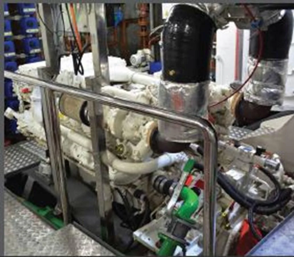 a machine with a large metal pipe aboard OCEAN KING AMERICANA Yacht for Sale