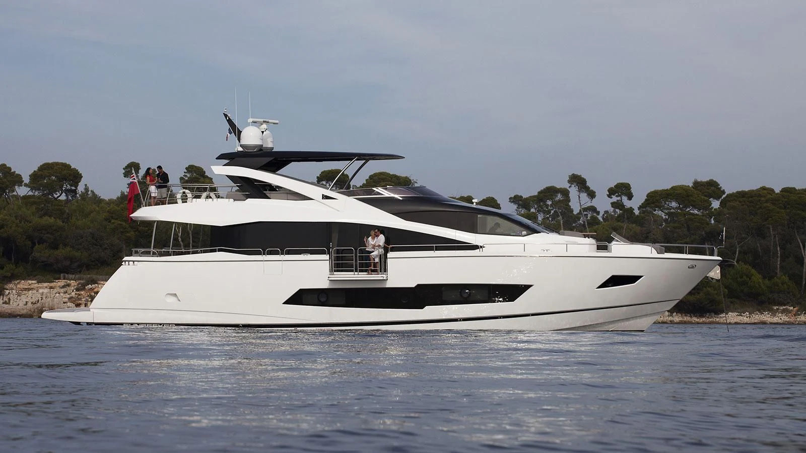 a white yacht on the water aboard X-ELEVEN Yacht for Sale
