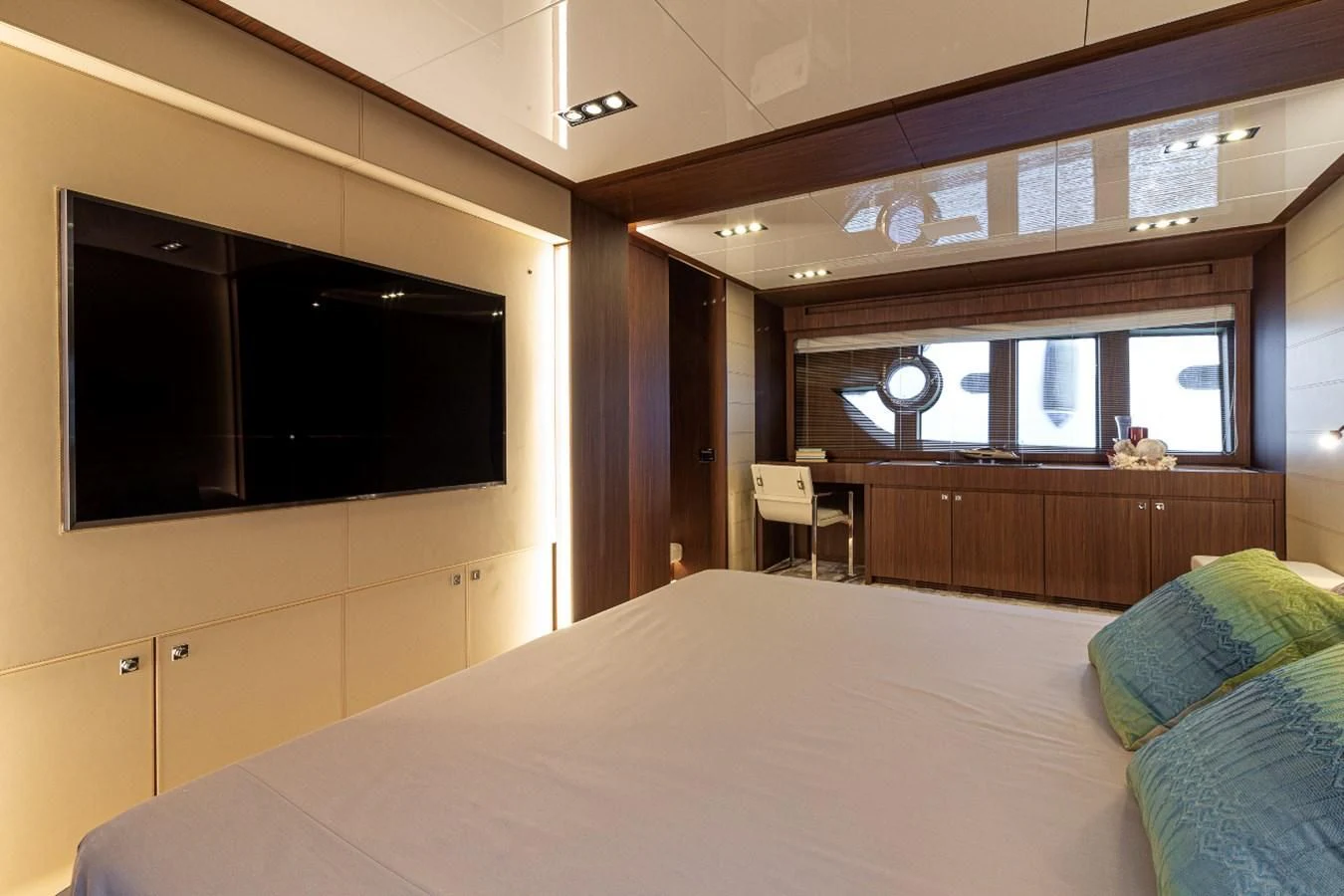 a bed room with a tv aboard DONNA SANTA Yacht for Sale