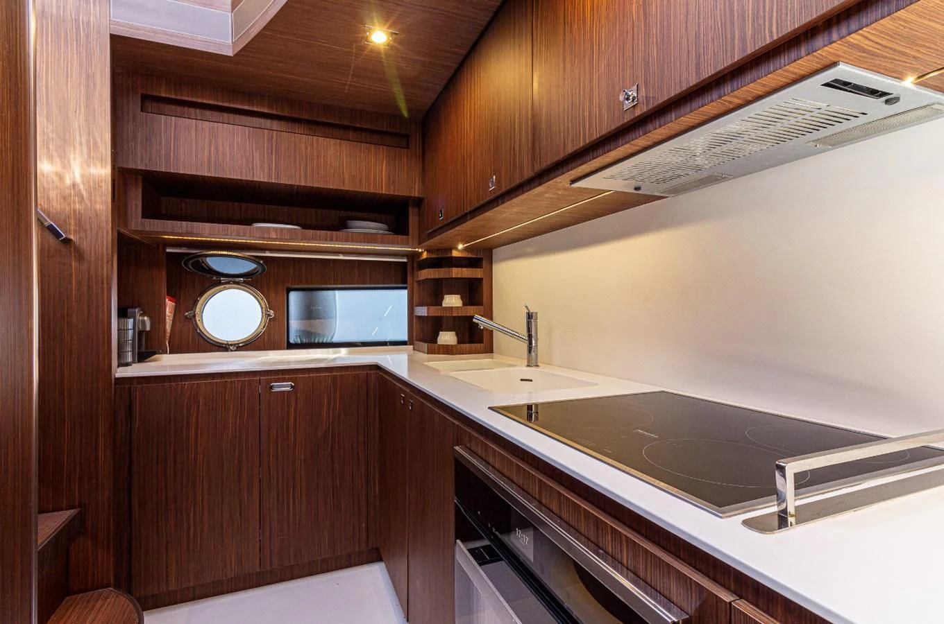a kitchen with a microwave oven aboard DONNA SANTA Yacht for Sale