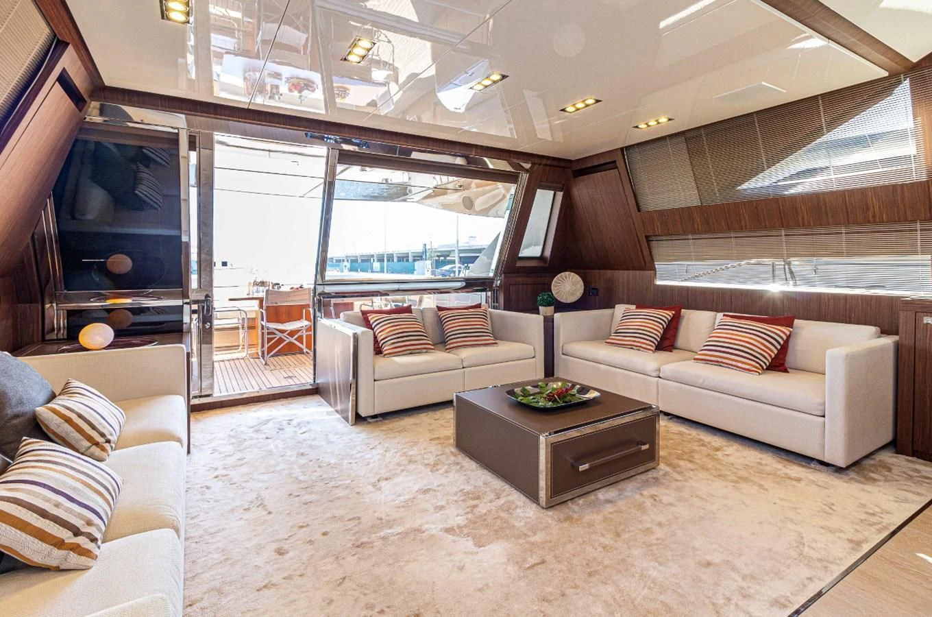 a living room with a large window aboard DONNA SANTA Yacht for Sale