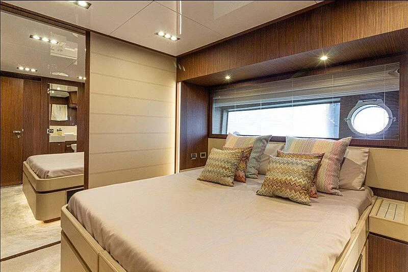 a bed in a room aboard DONNA SANTA Yacht for Sale