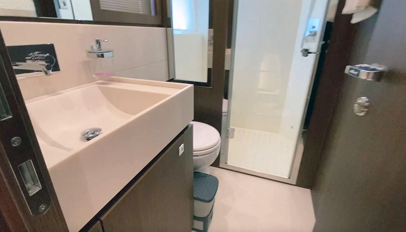a bathroom with a sink and toilet aboard DONNA SANTA Yacht for Sale