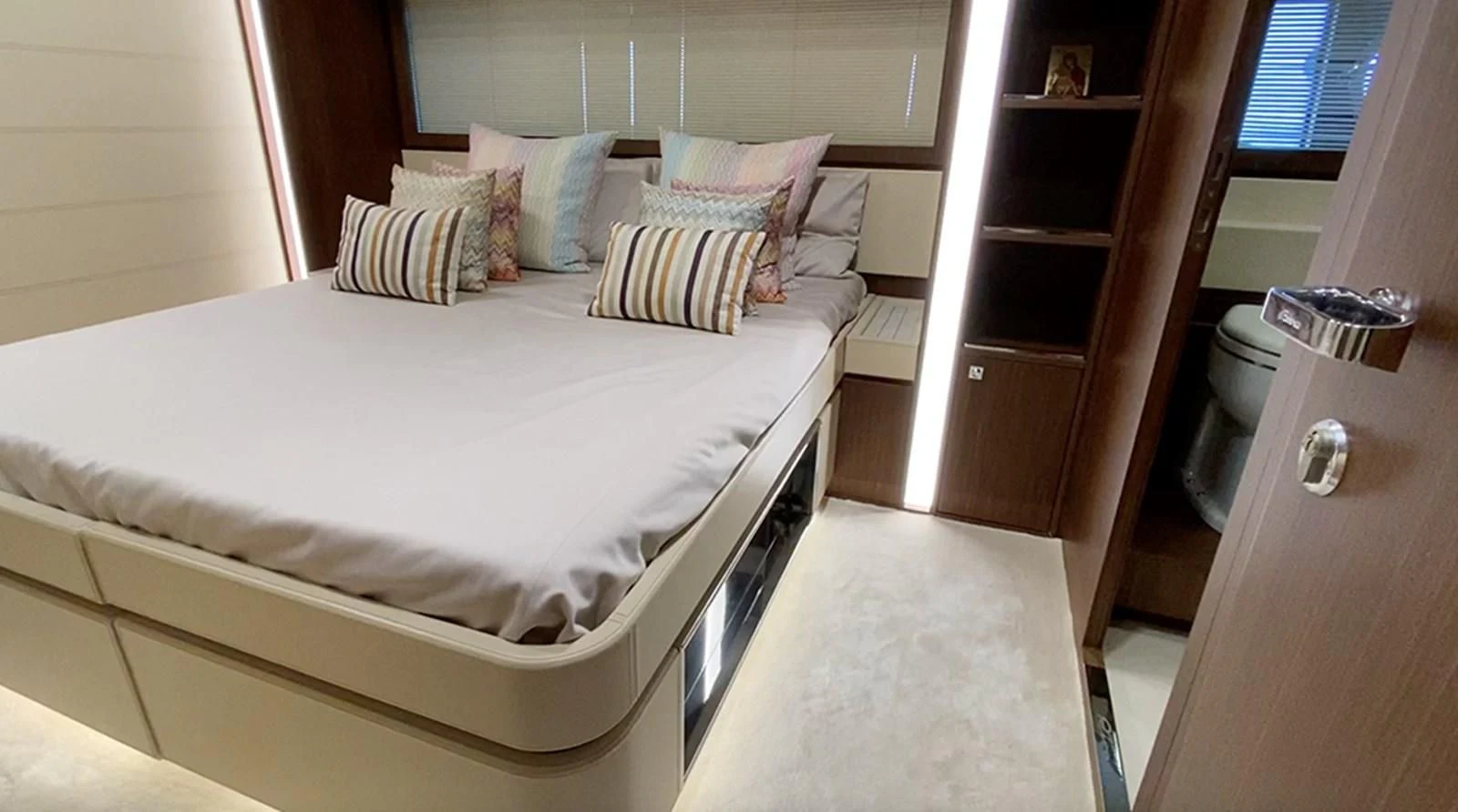 a bed with white sheets aboard DONNA SANTA Yacht for Sale