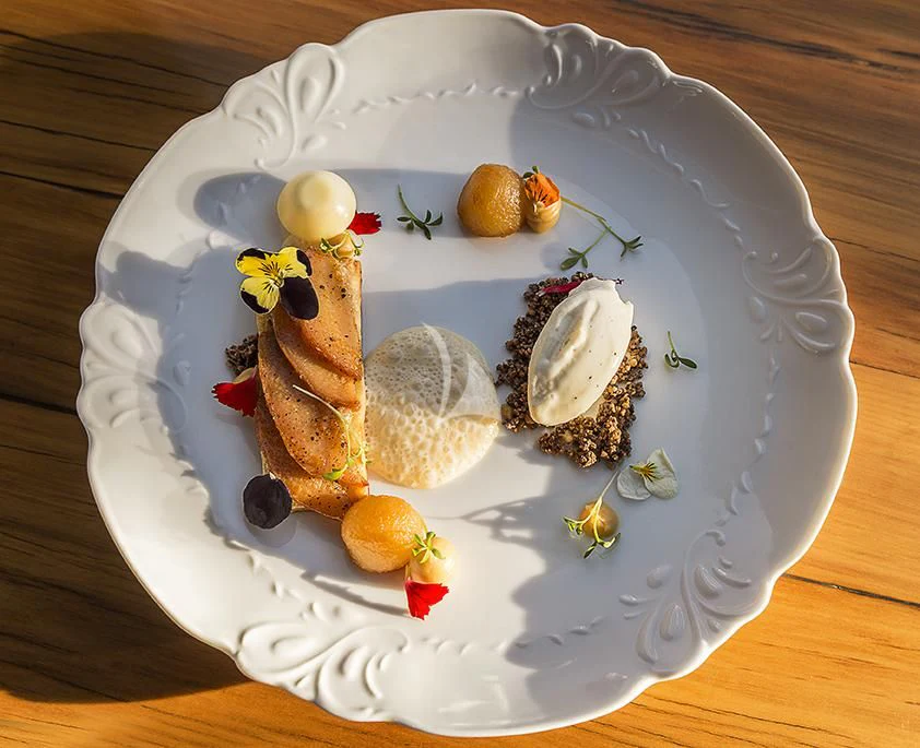 a plate of food aboard O'LION Yacht for Sale