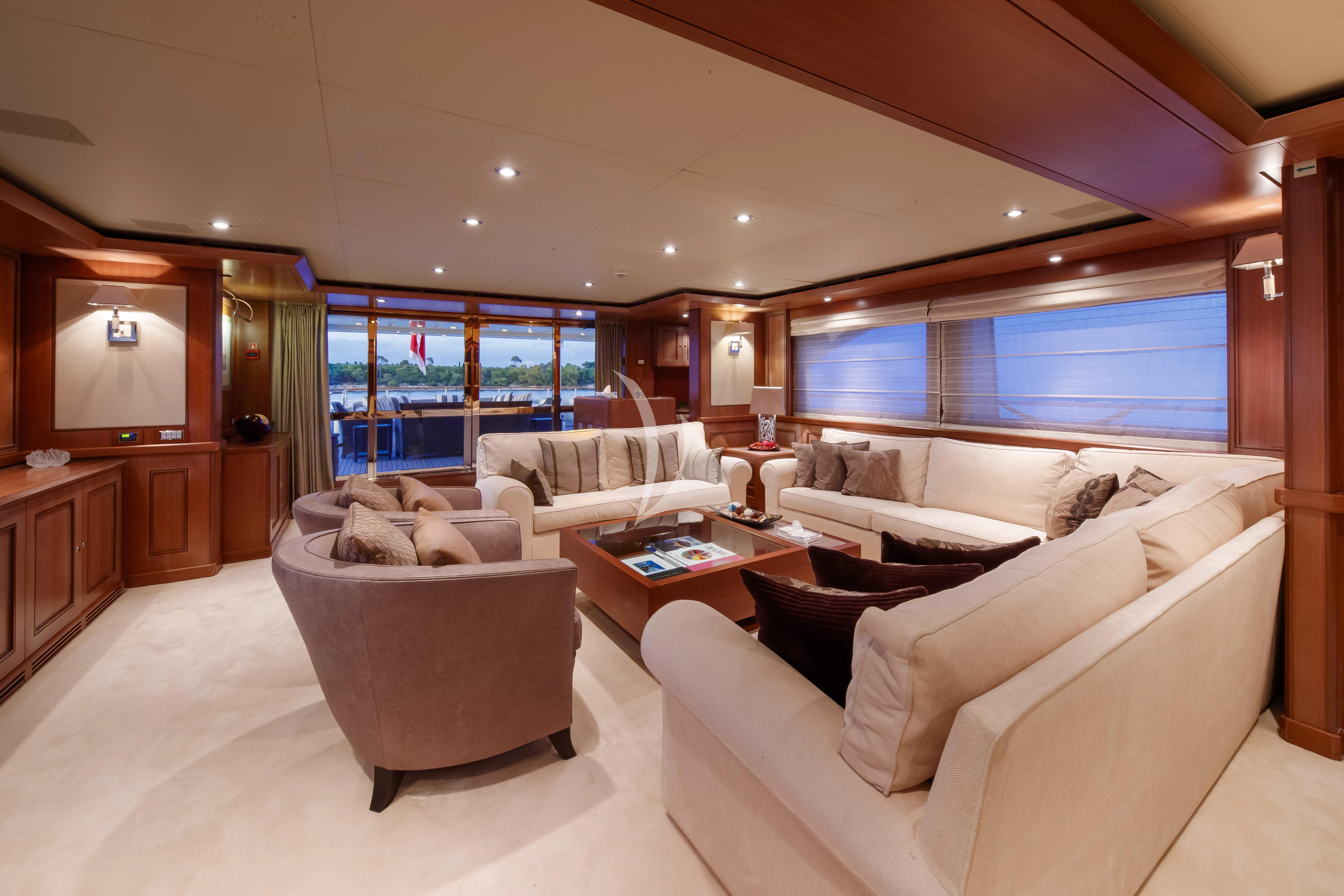 a living room with a large window aboard O'LION Yacht for Sale