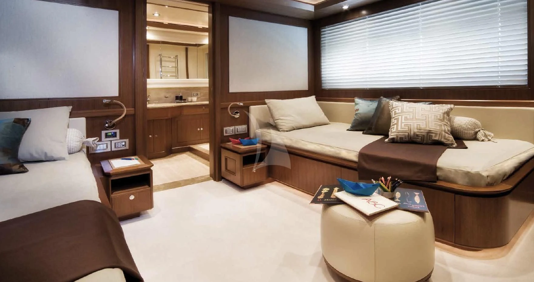 a room with a bed and a couch aboard O'LION Yacht for Sale