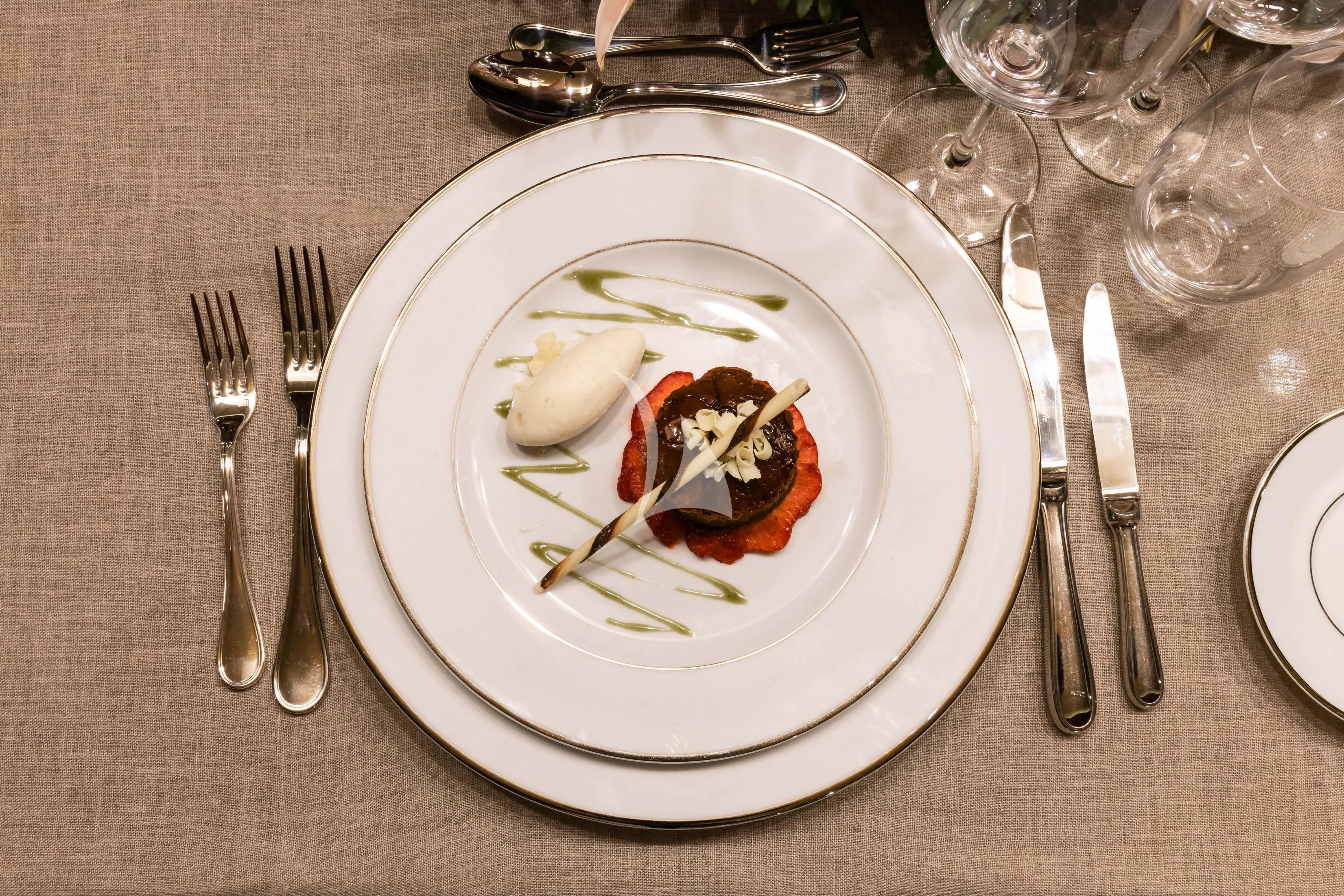 a plate of food aboard O'LION Yacht for Sale