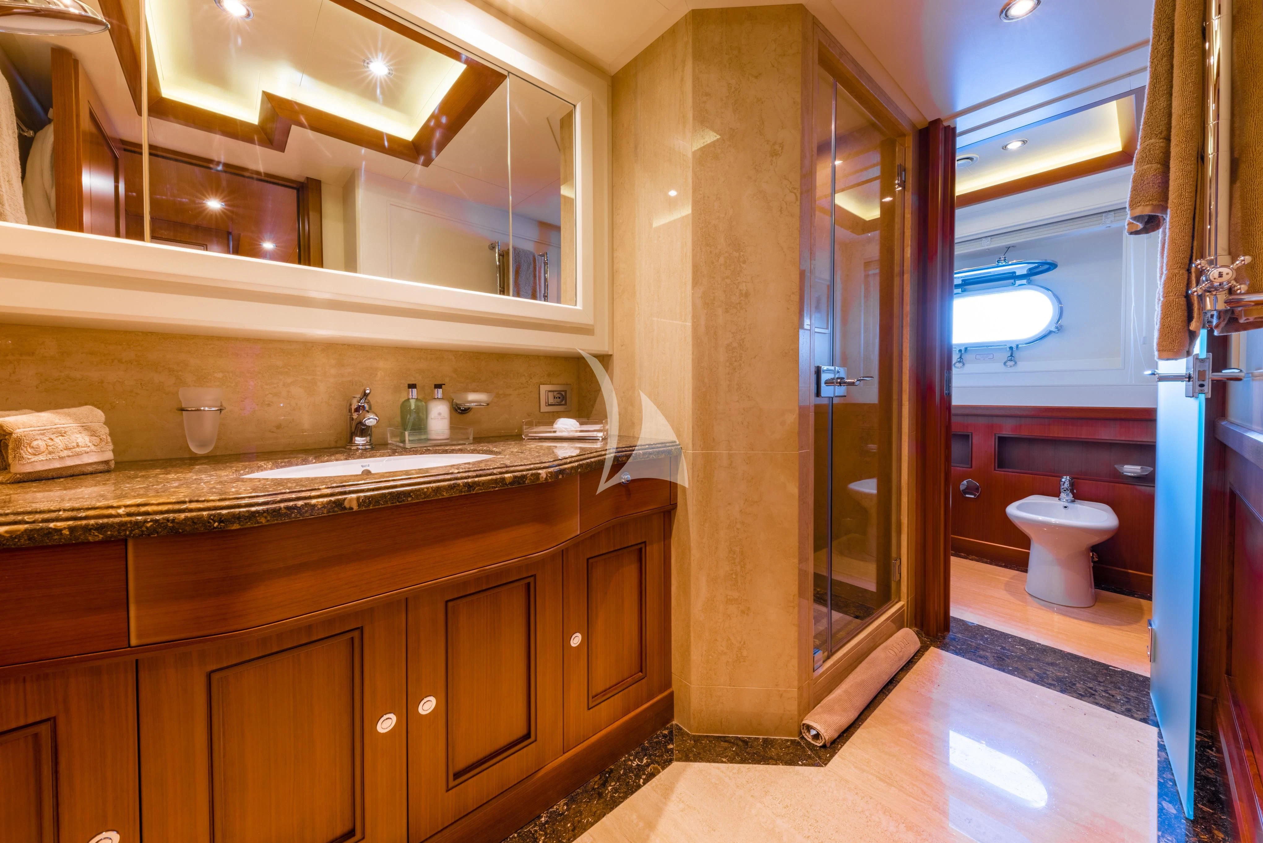 a bathroom with a sink and a toilet aboard O'LION Yacht for Sale