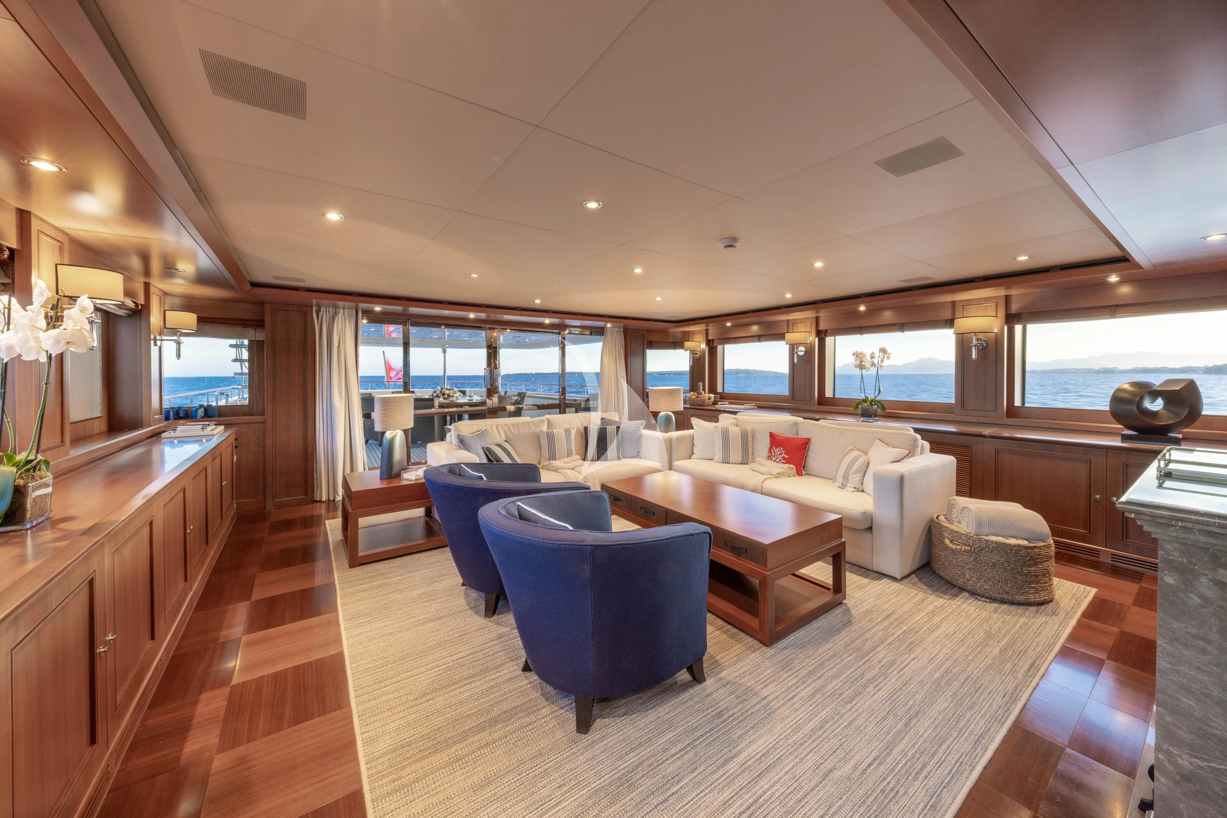 a living room with a large window aboard O'LION Yacht for Sale