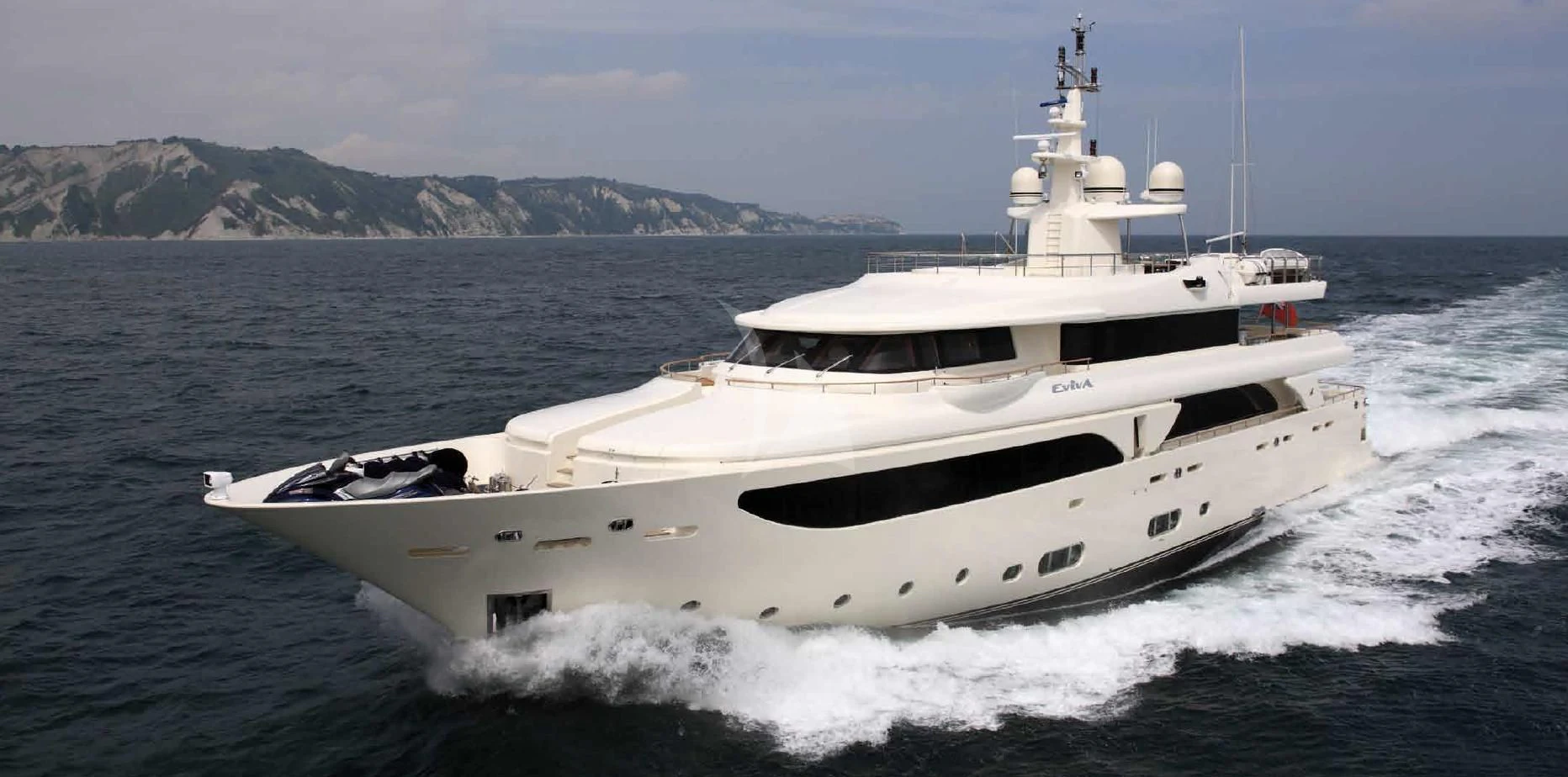 a white yacht on the water aboard O'LION Yacht for Sale