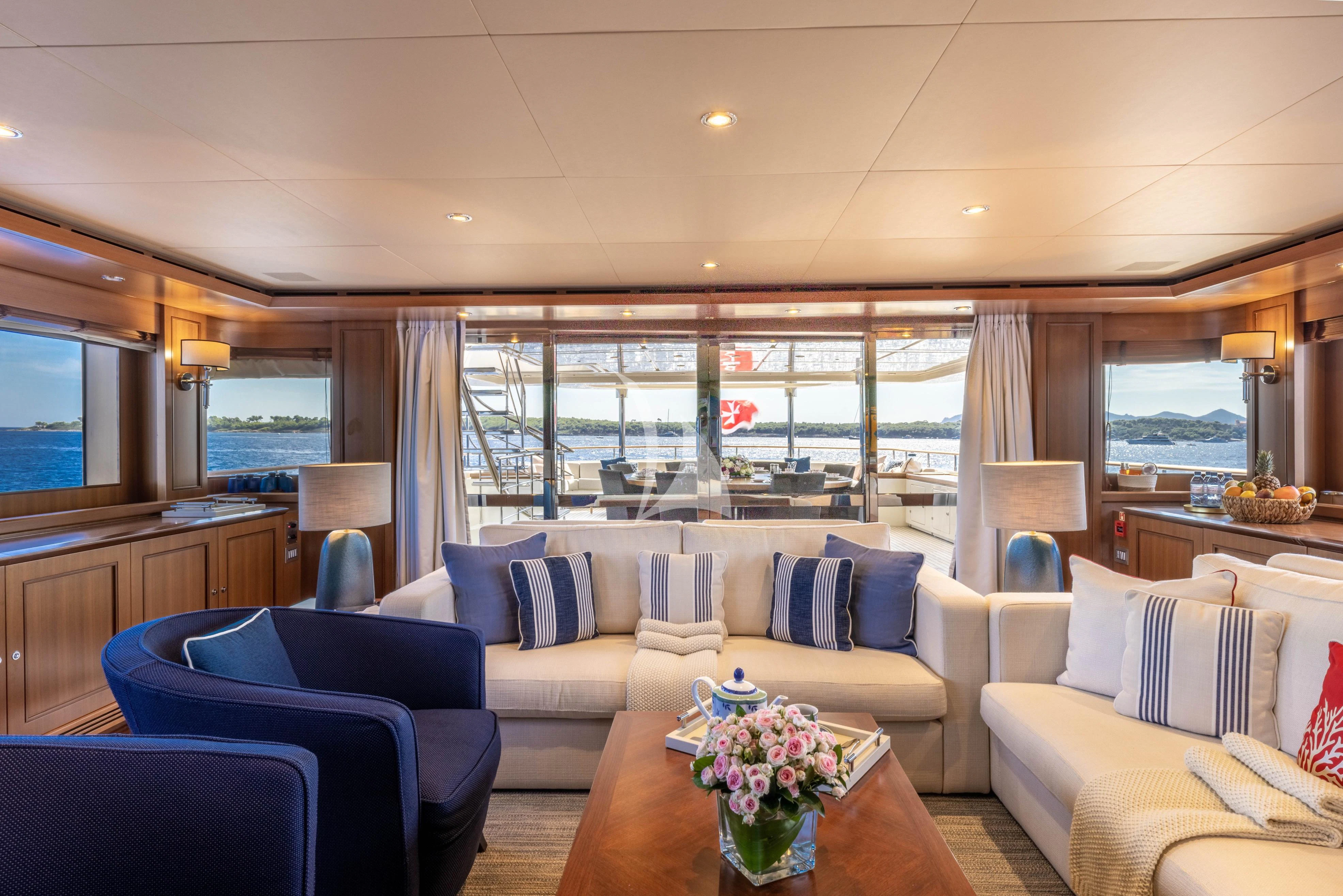 a living room with a large window aboard O'LION Yacht for Sale