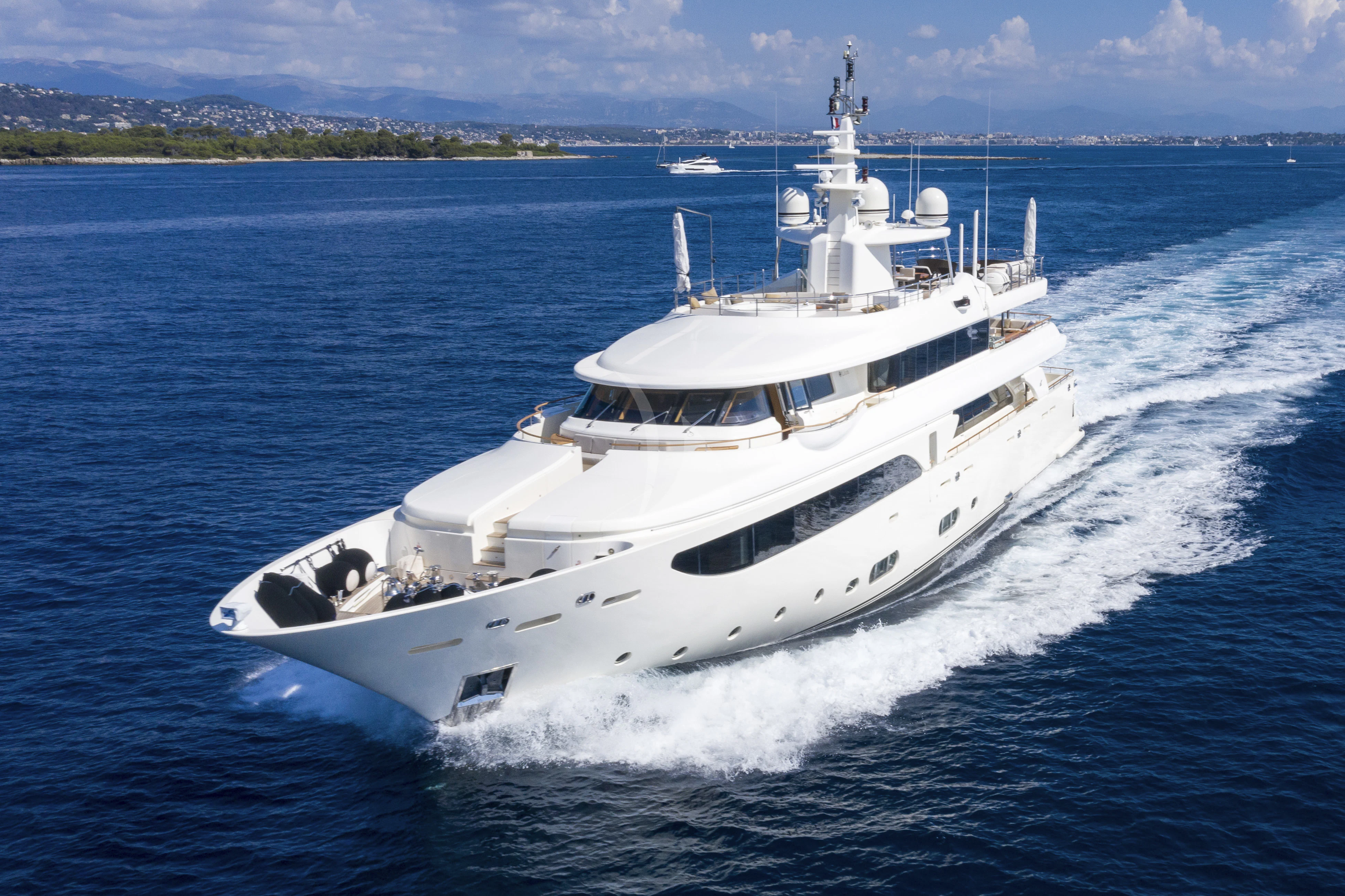 a white yacht on the water aboard O'LION Yacht for Sale