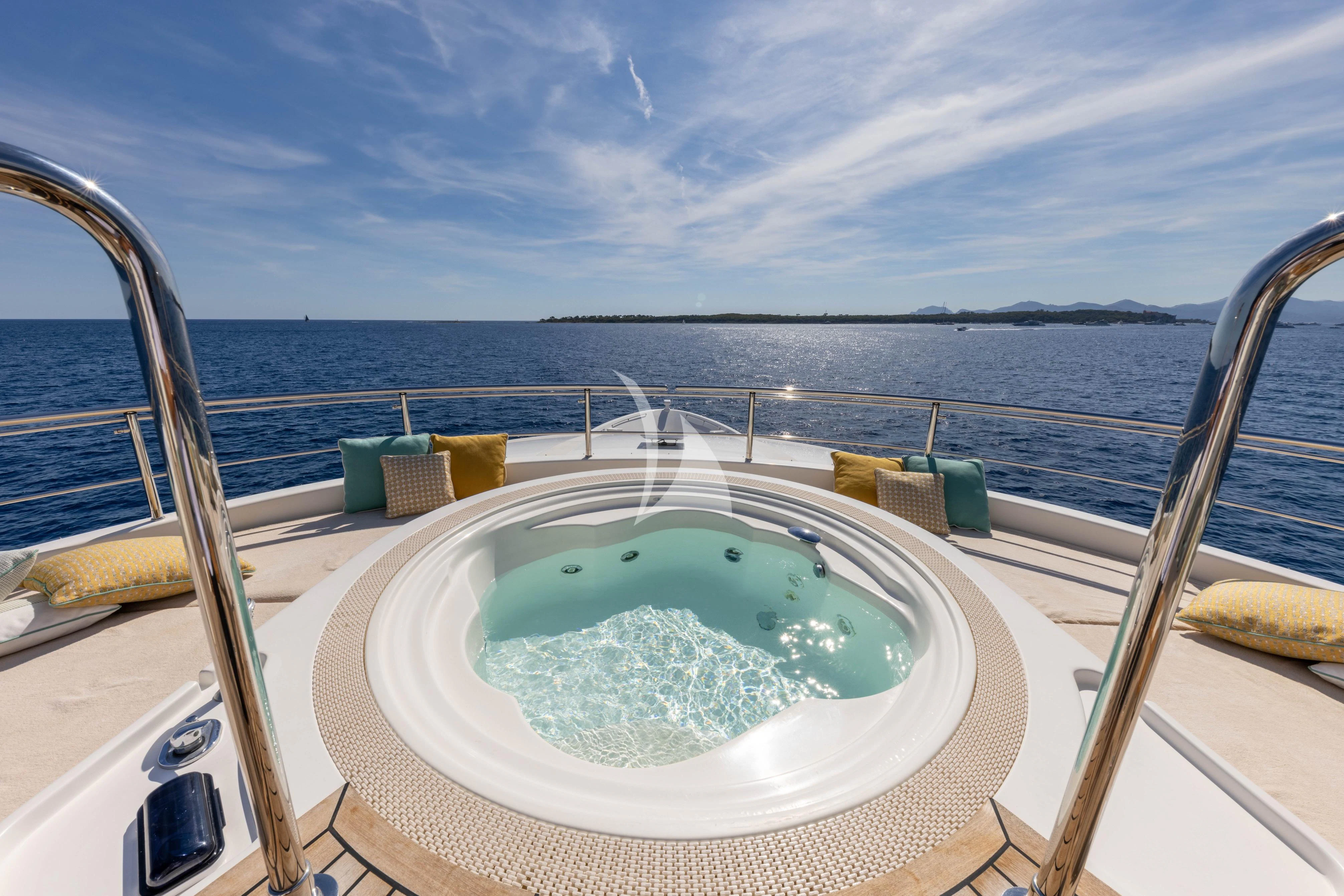 a swimming pool on a deck aboard O'LION Yacht for Sale