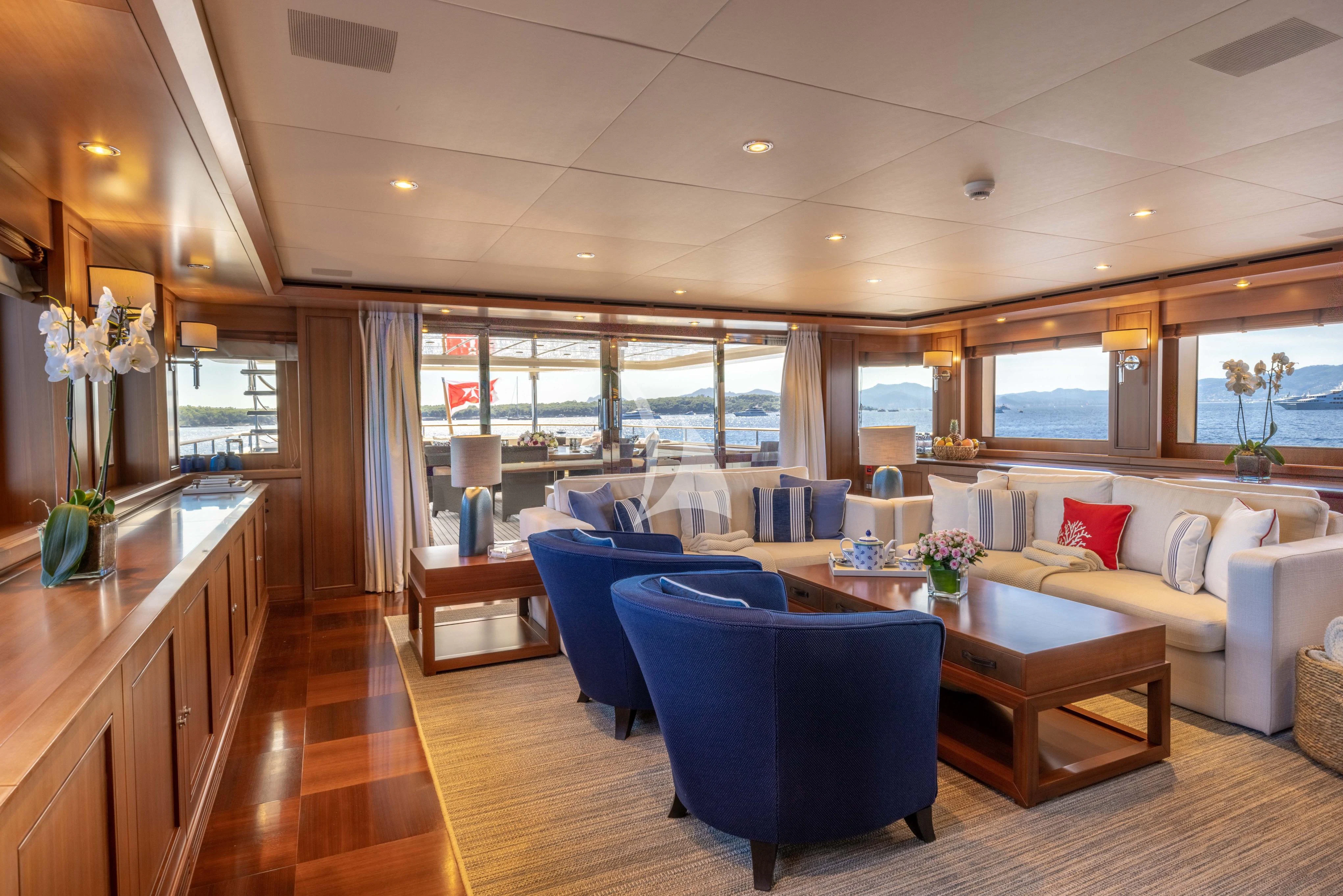a living room with a large window aboard O'LION Yacht for Sale