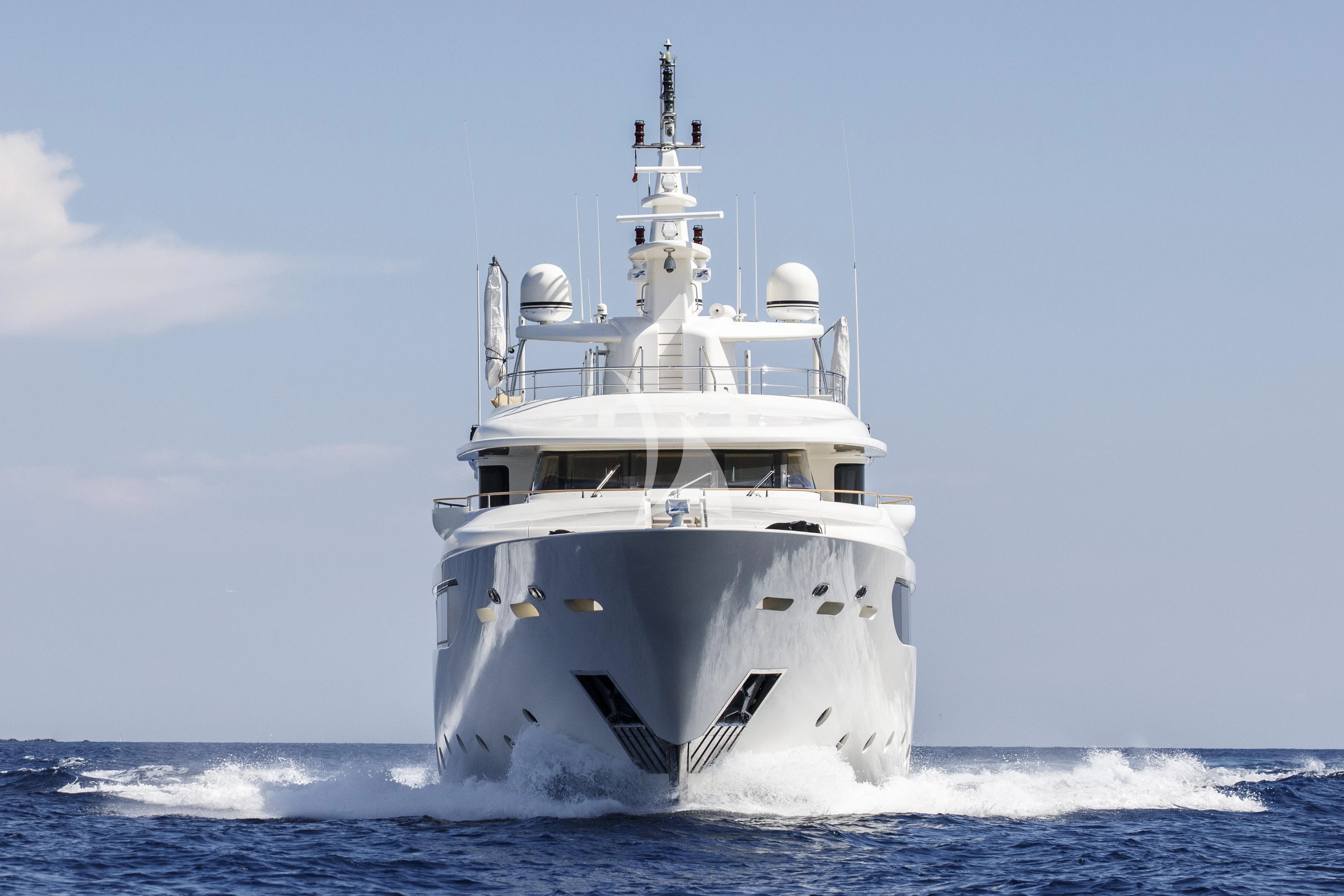 a large white ship in the water aboard O'LION Yacht for Sale