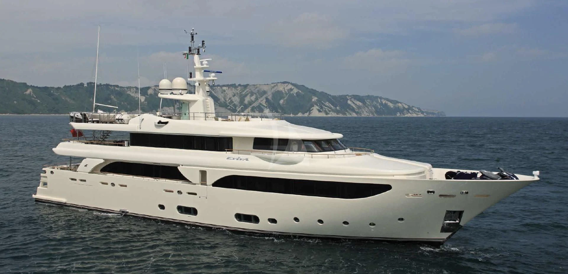 a white yacht in the water aboard O'LION Yacht for Sale
