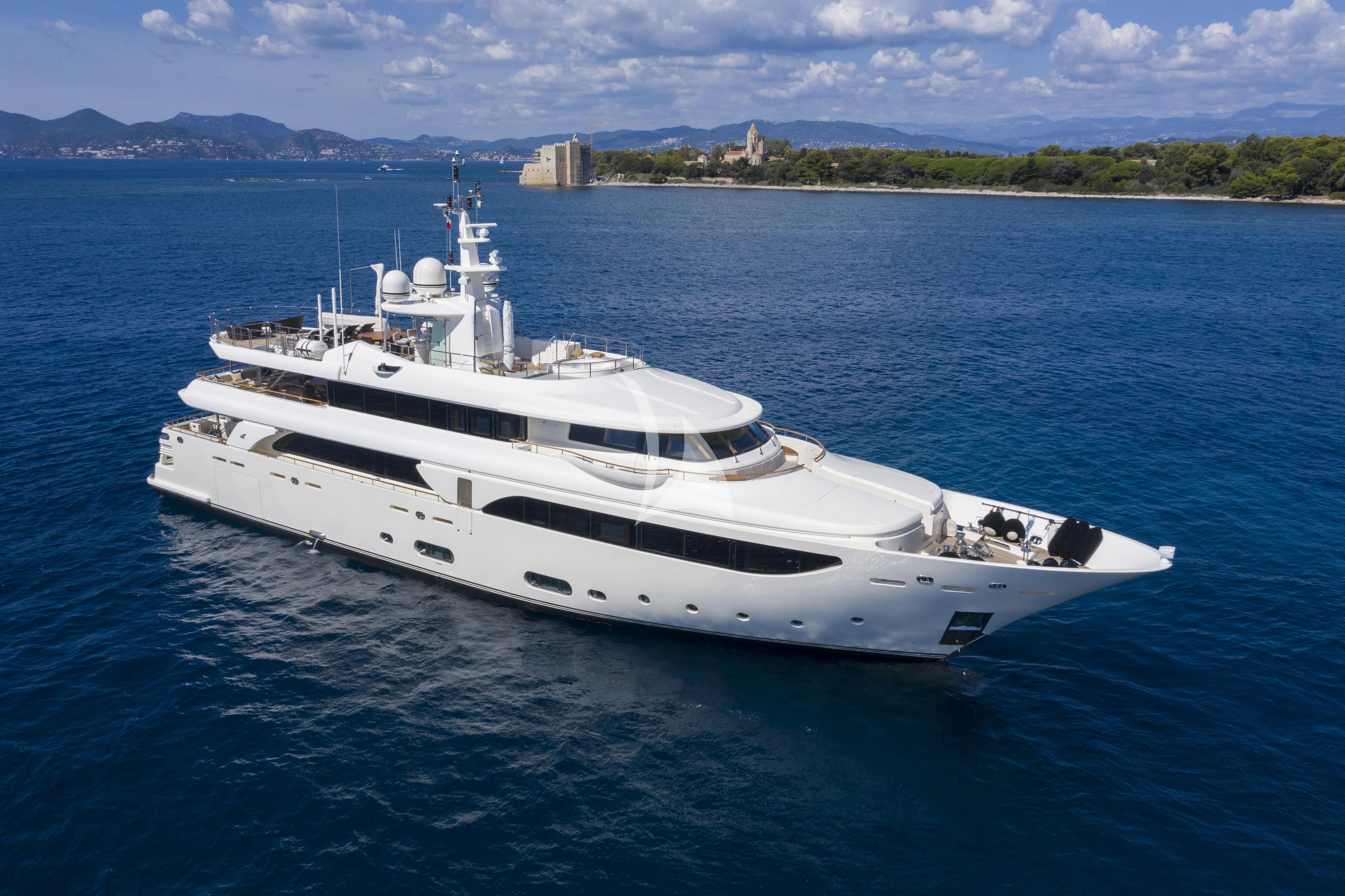 a white yacht in the water aboard O'LION Yacht for Sale