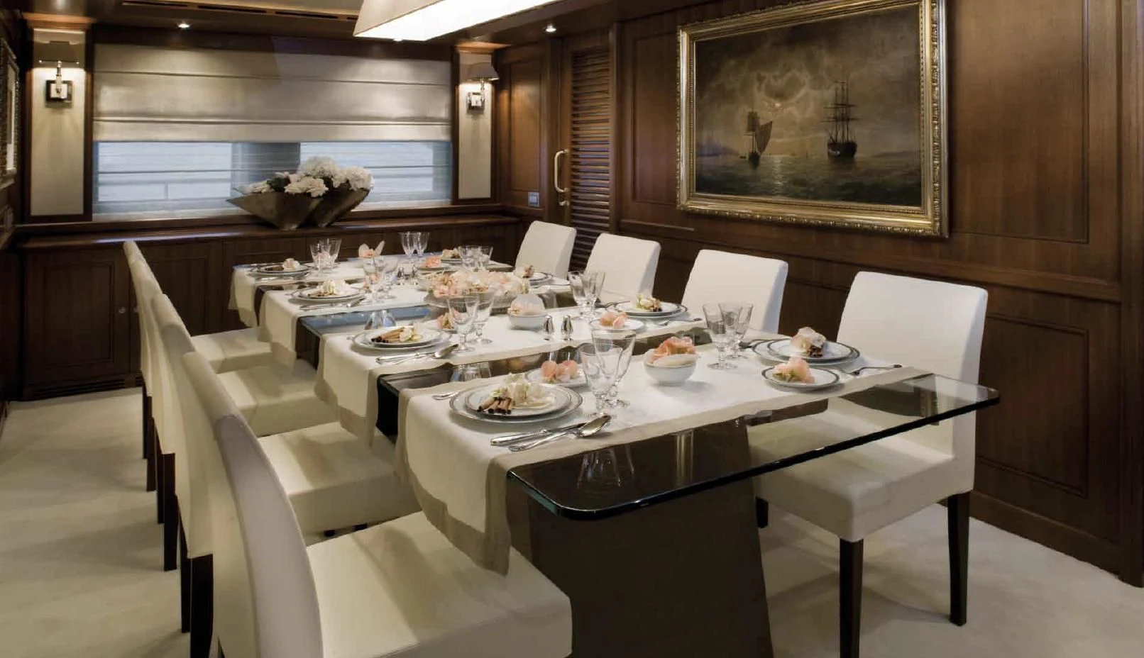 a table set for a dinner aboard O'LION Yacht for Sale