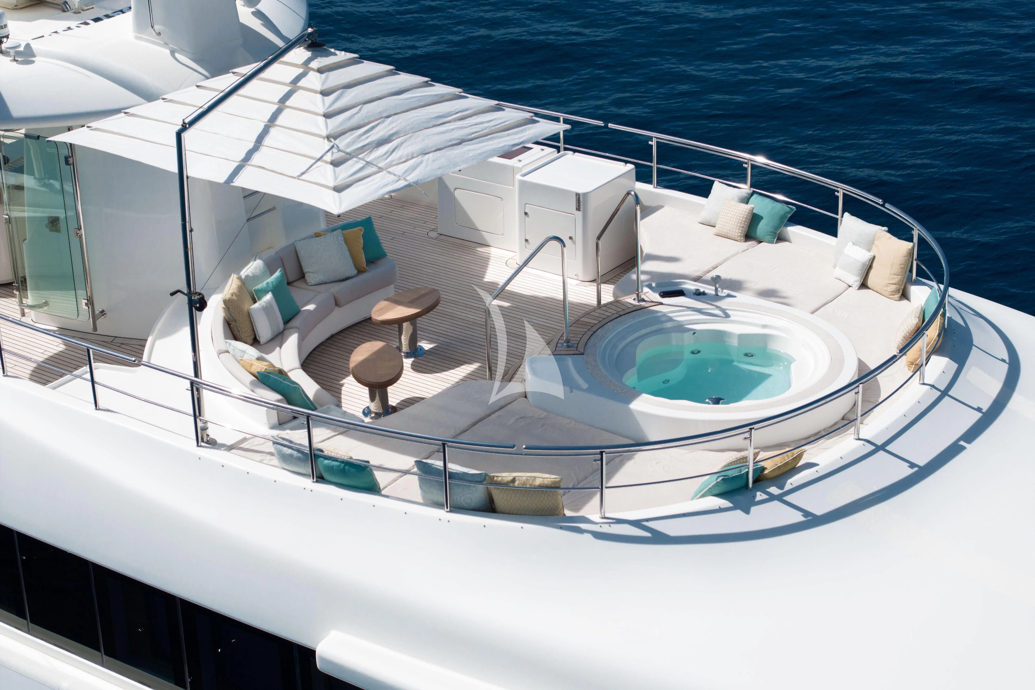 a large white swimming pool aboard O'LION Yacht for Sale