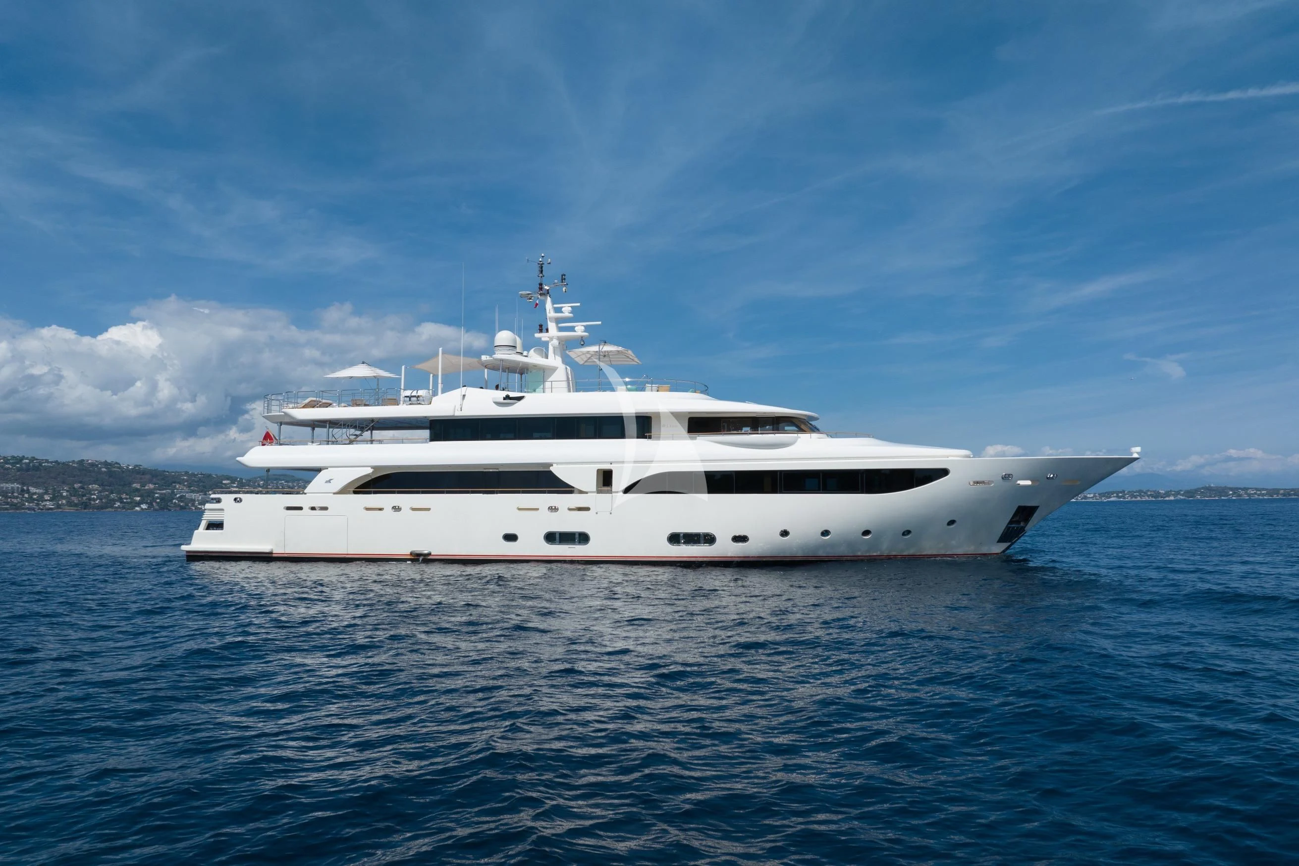 a white yacht in the water aboard O'LION Yacht for Sale