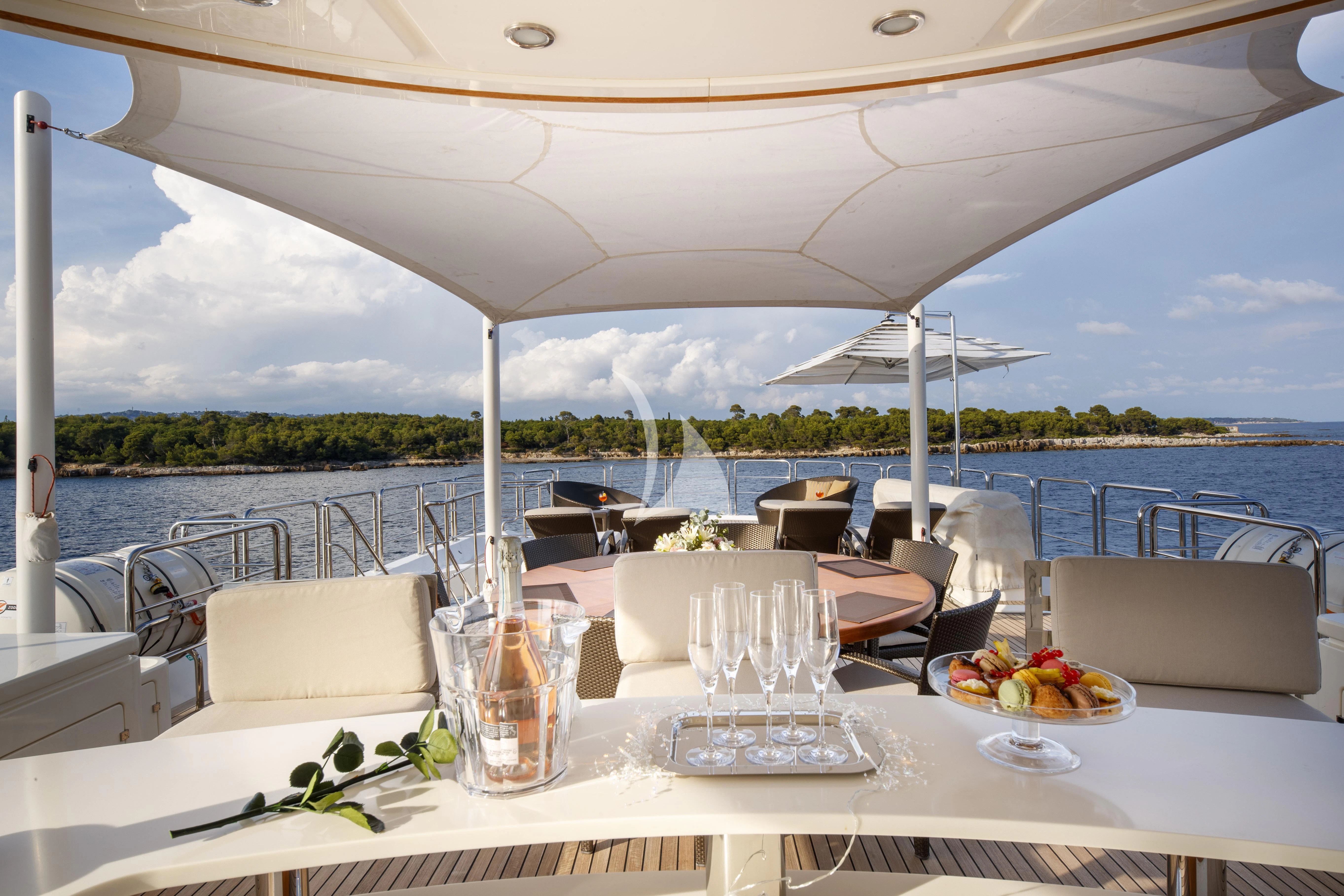 a table set for a meal aboard O'LION Yacht for Sale