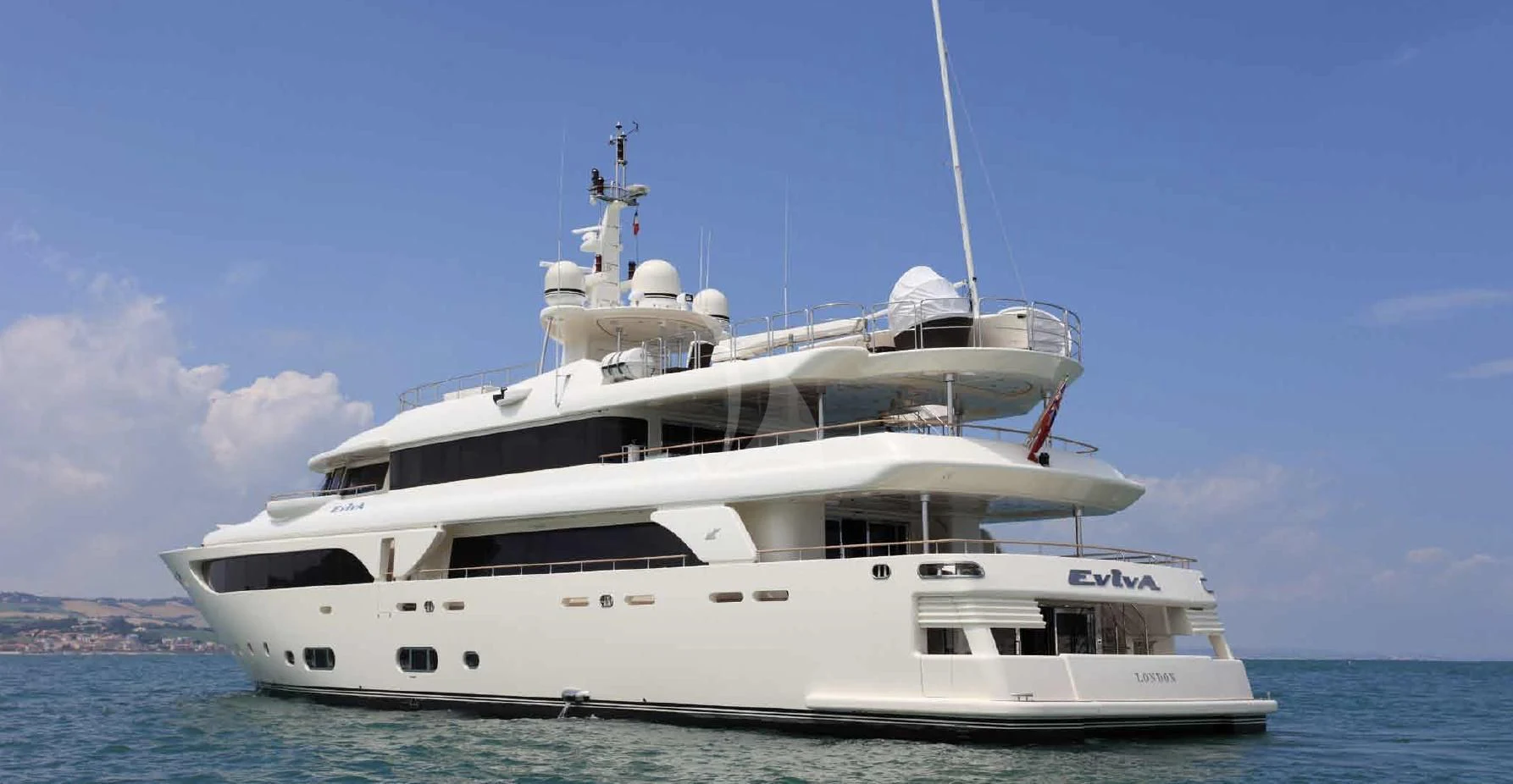 a white yacht on the water aboard O'LION Yacht for Sale