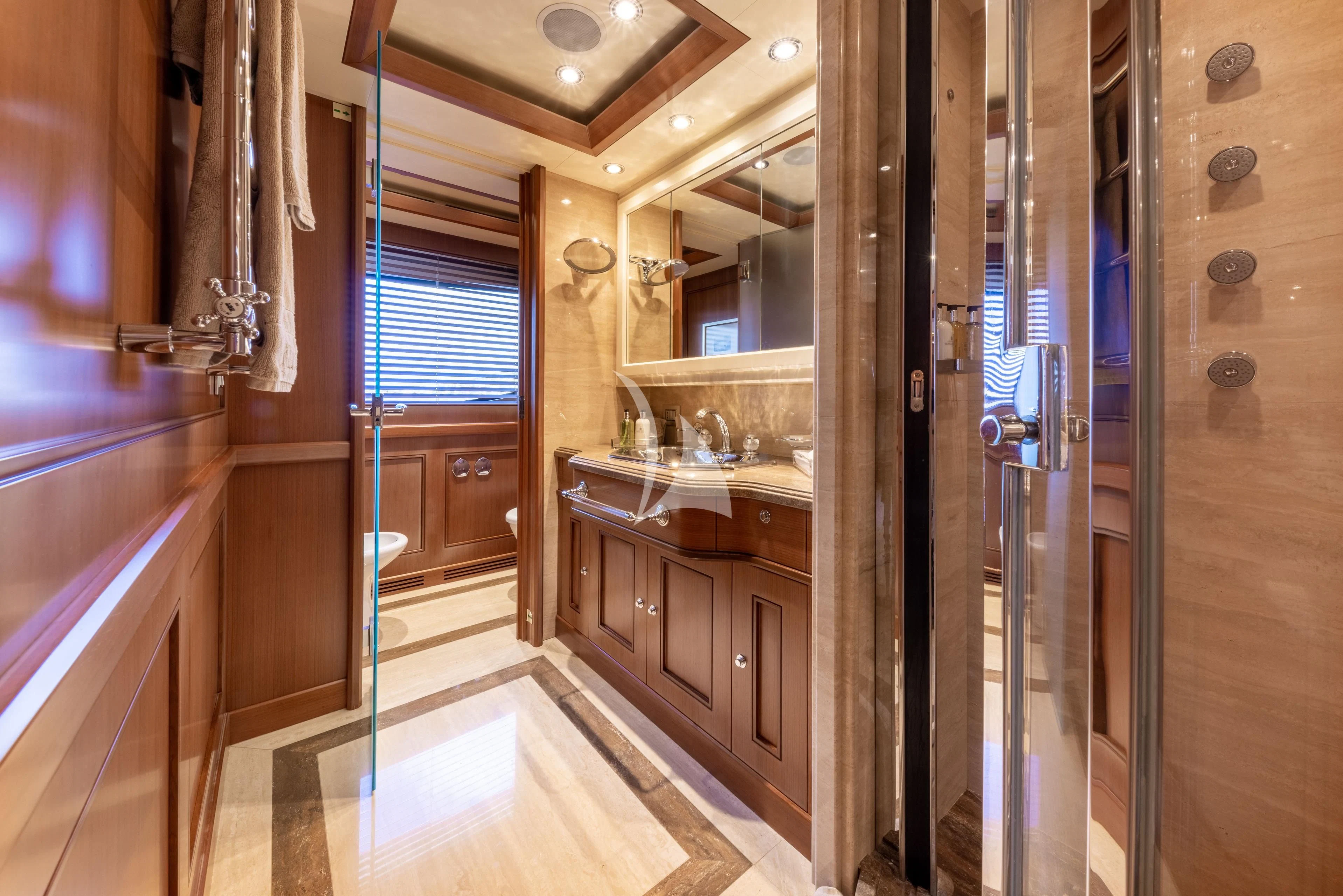 a bathroom with a large shower unit aboard O'LION Yacht for Sale