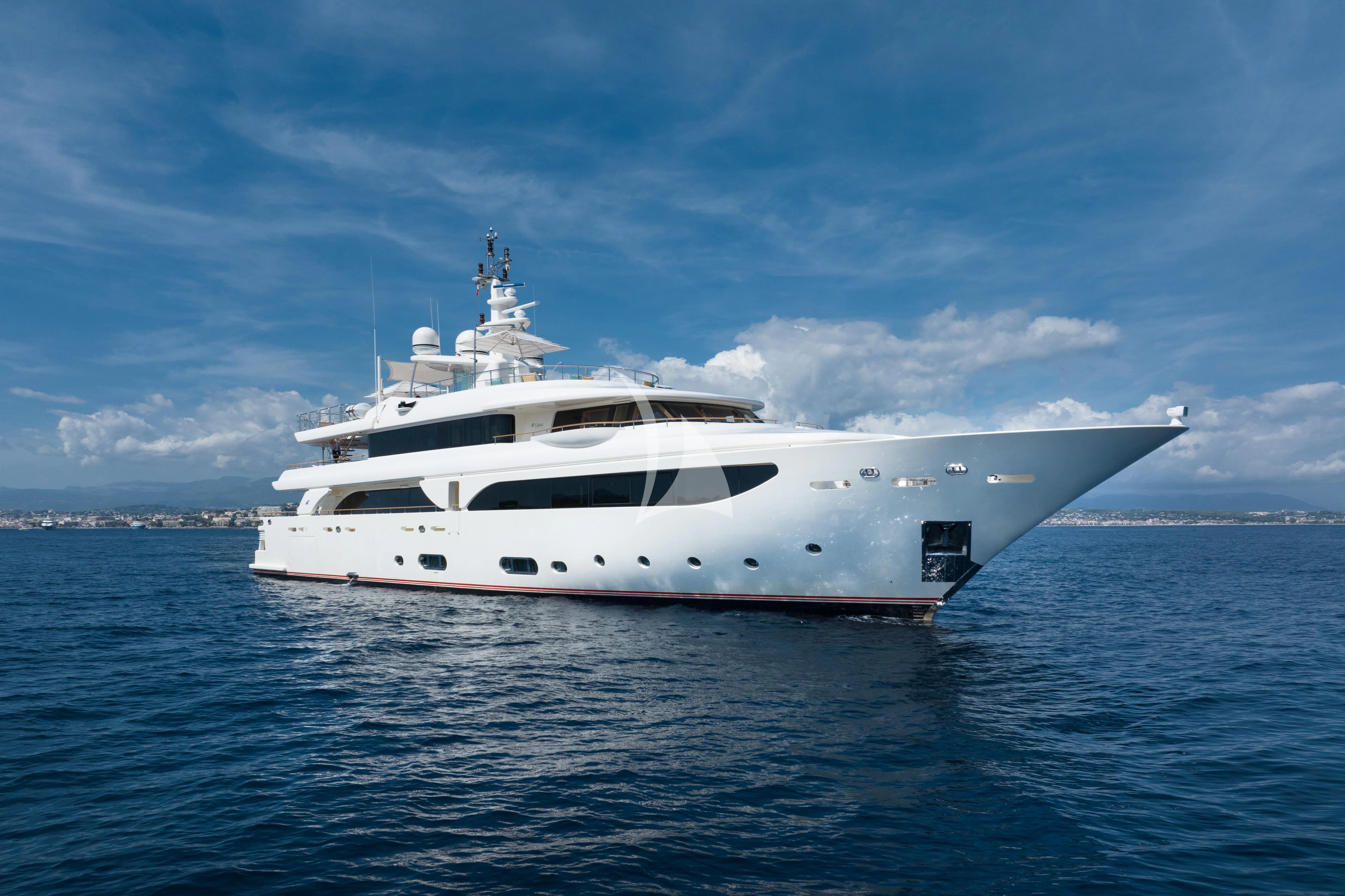 a white yacht in the water aboard O'LION Yacht for Sale