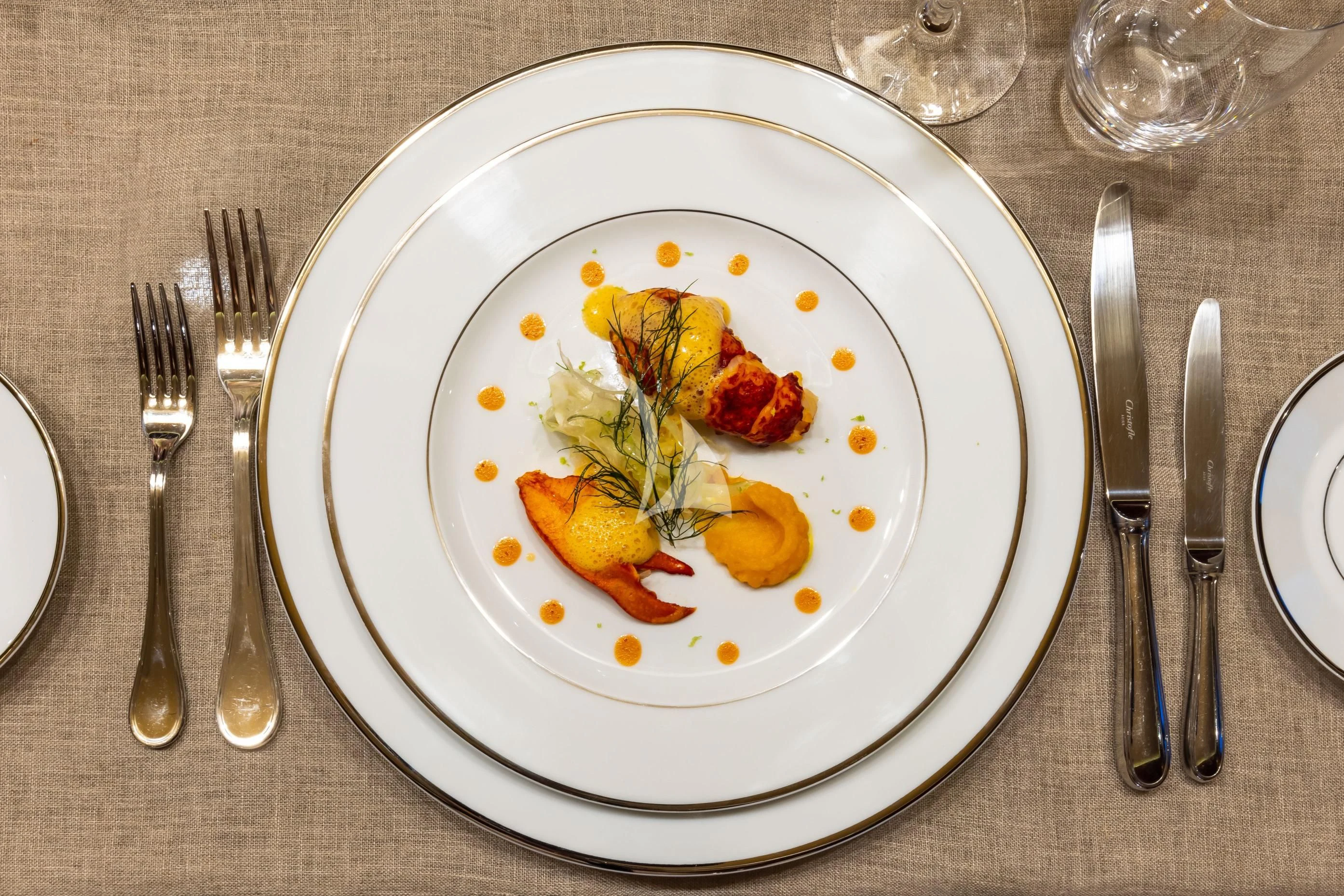 a plate of food aboard O'LION Yacht for Sale