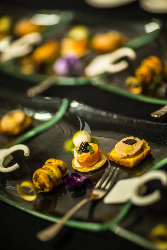 a plate of sushi aboard O'LION Yacht for Sale