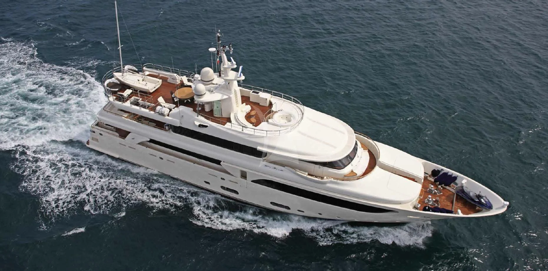 a white boat on the water aboard O'LION Yacht for Sale