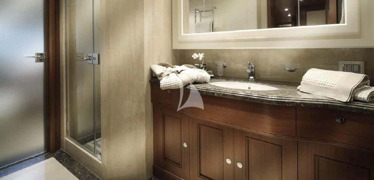 a bathroom with a sink and a shower aboard O'LION Yacht for Sale