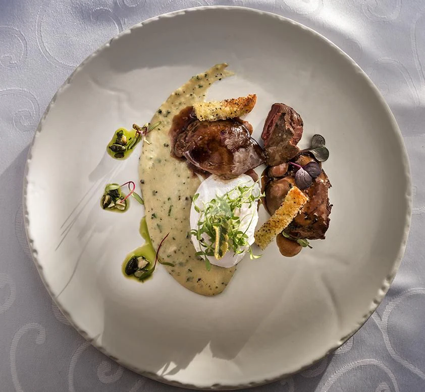 a plate of food aboard O'LION Yacht for Sale