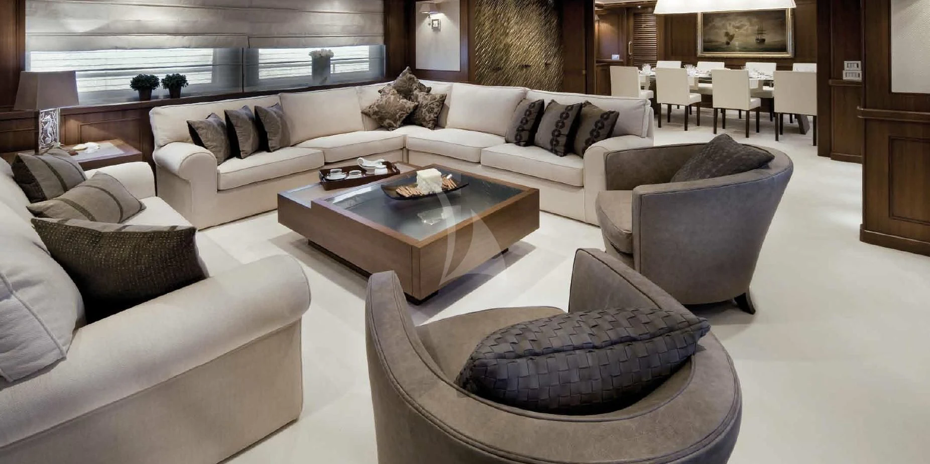 a living room with a couch and a coffee table aboard O'LION Yacht for Sale