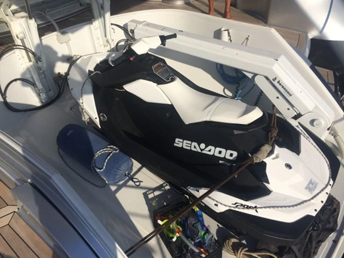 a black and white race car aboard CHAKLOO Yacht for Sale