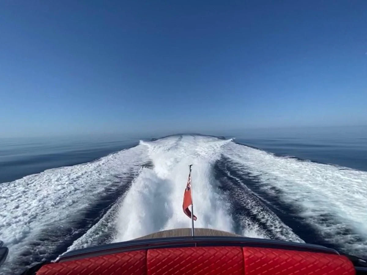 a snowy road with a red flag aboard CHAKLOO Yacht for Sale