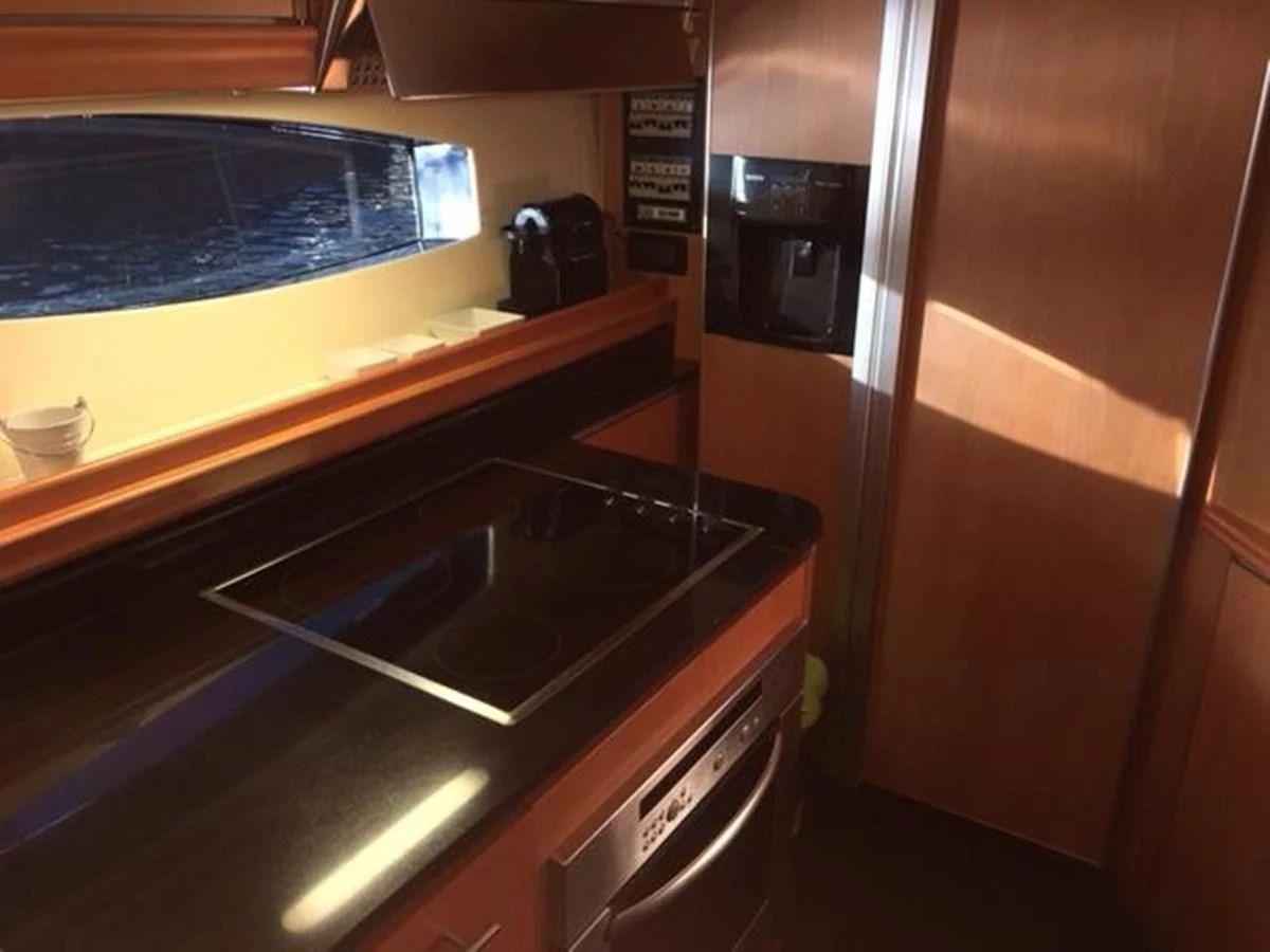 a kitchen with a sink and a microwave aboard CHAKLOO Yacht for Sale