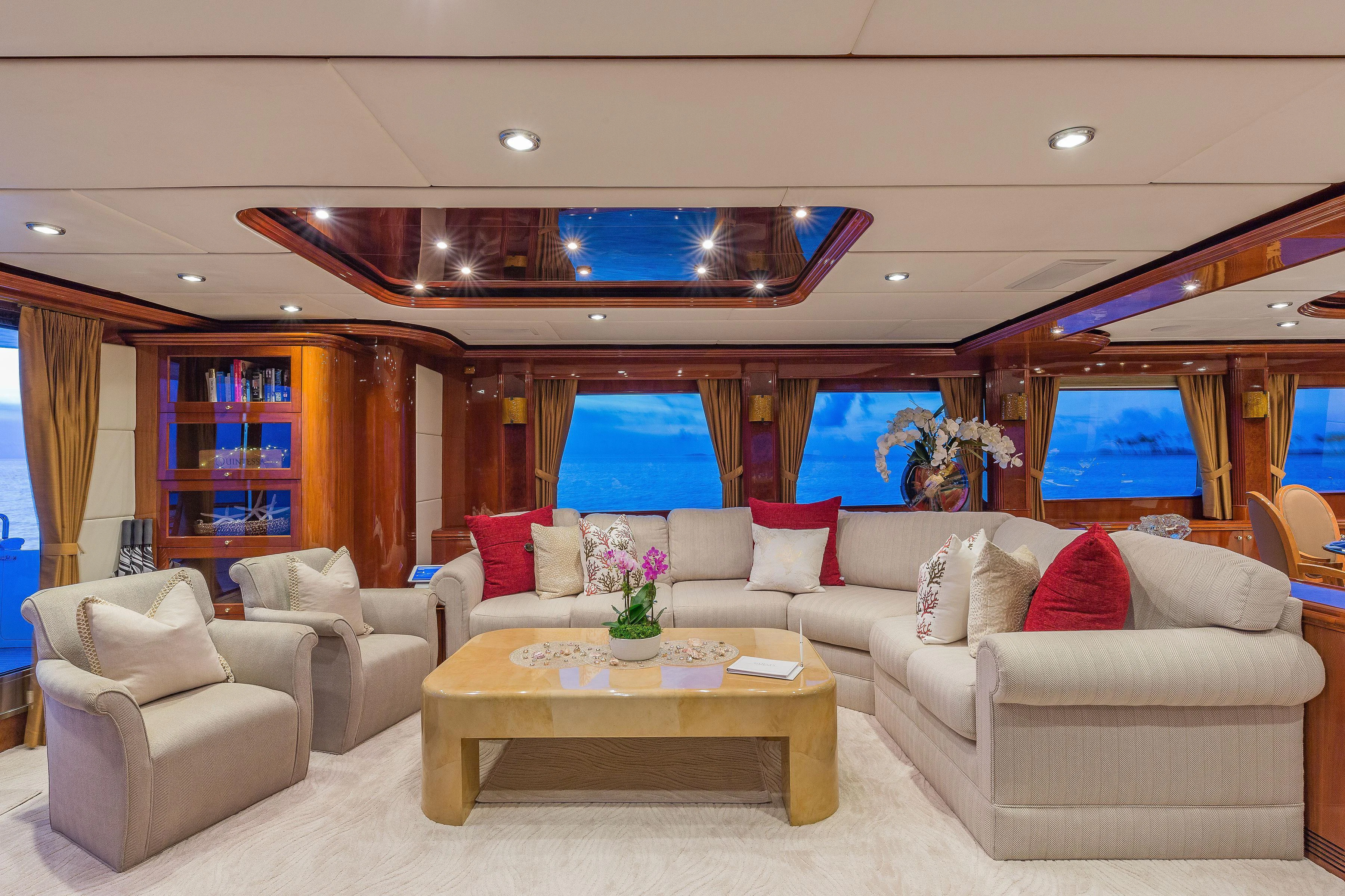 a living room with a large window aboard CAPRICE I Yacht for Sale