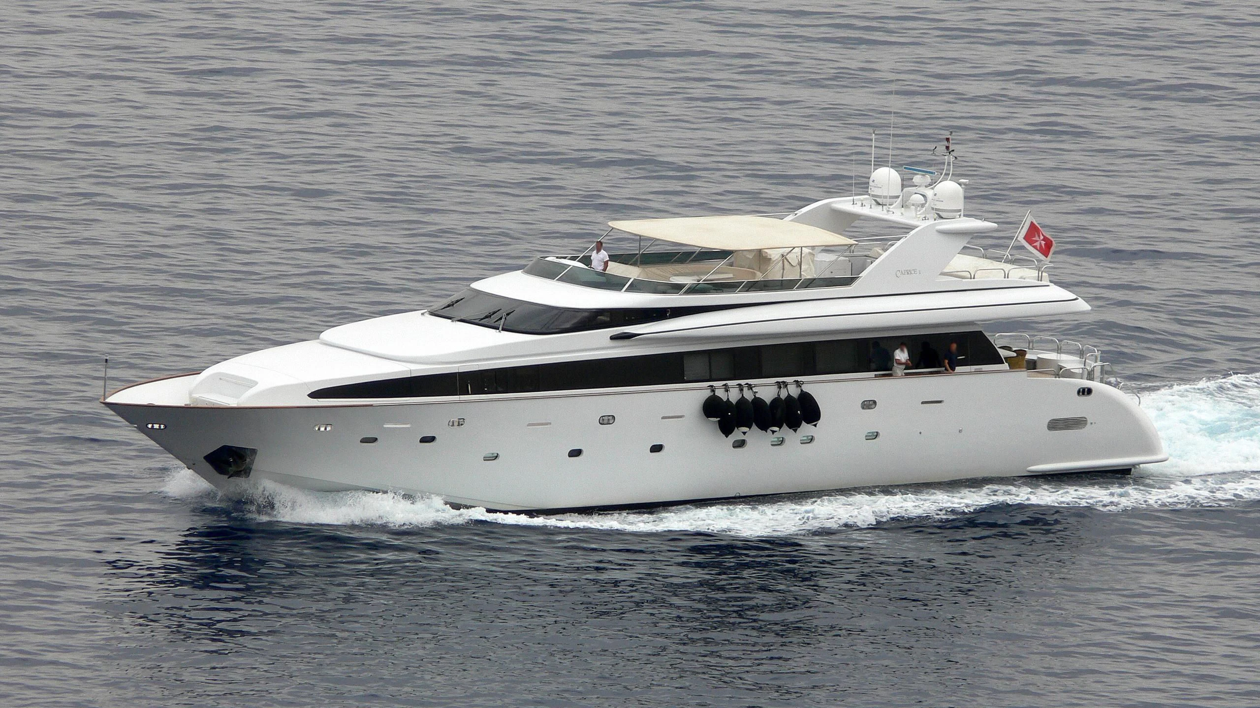 a white yacht on the water aboard CAPRICE I Yacht for Sale