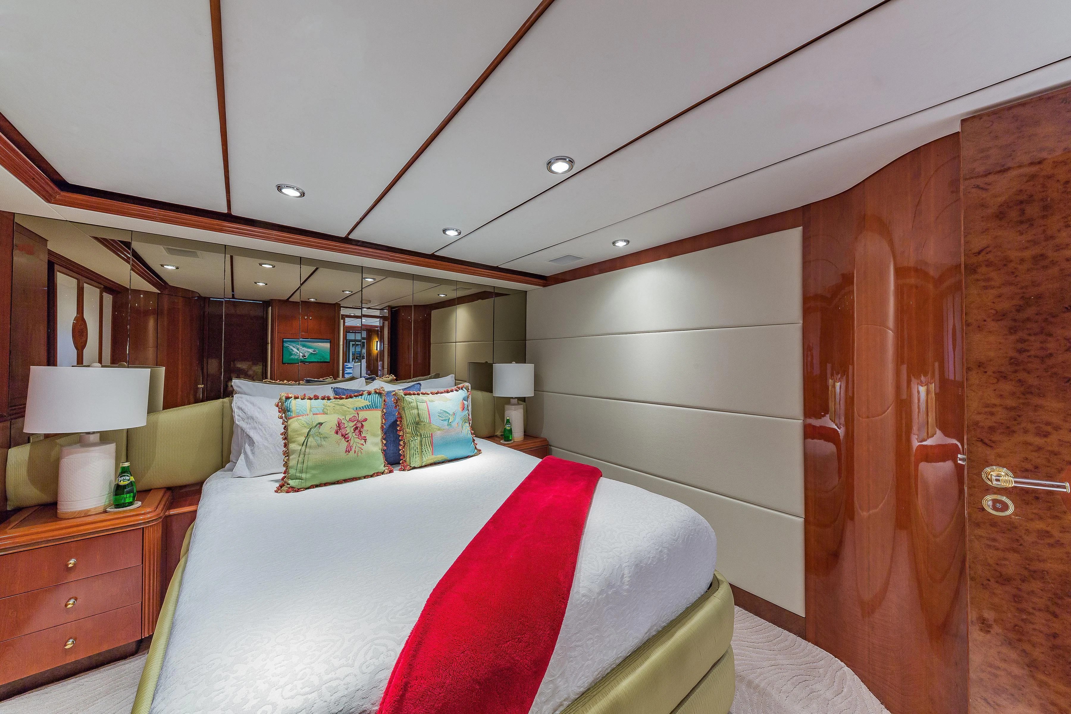 a bed in a room aboard CAPRICE I Yacht for Sale