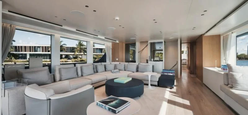 a living room with a large window aboard DON'T TELL MOM Yacht for Sale