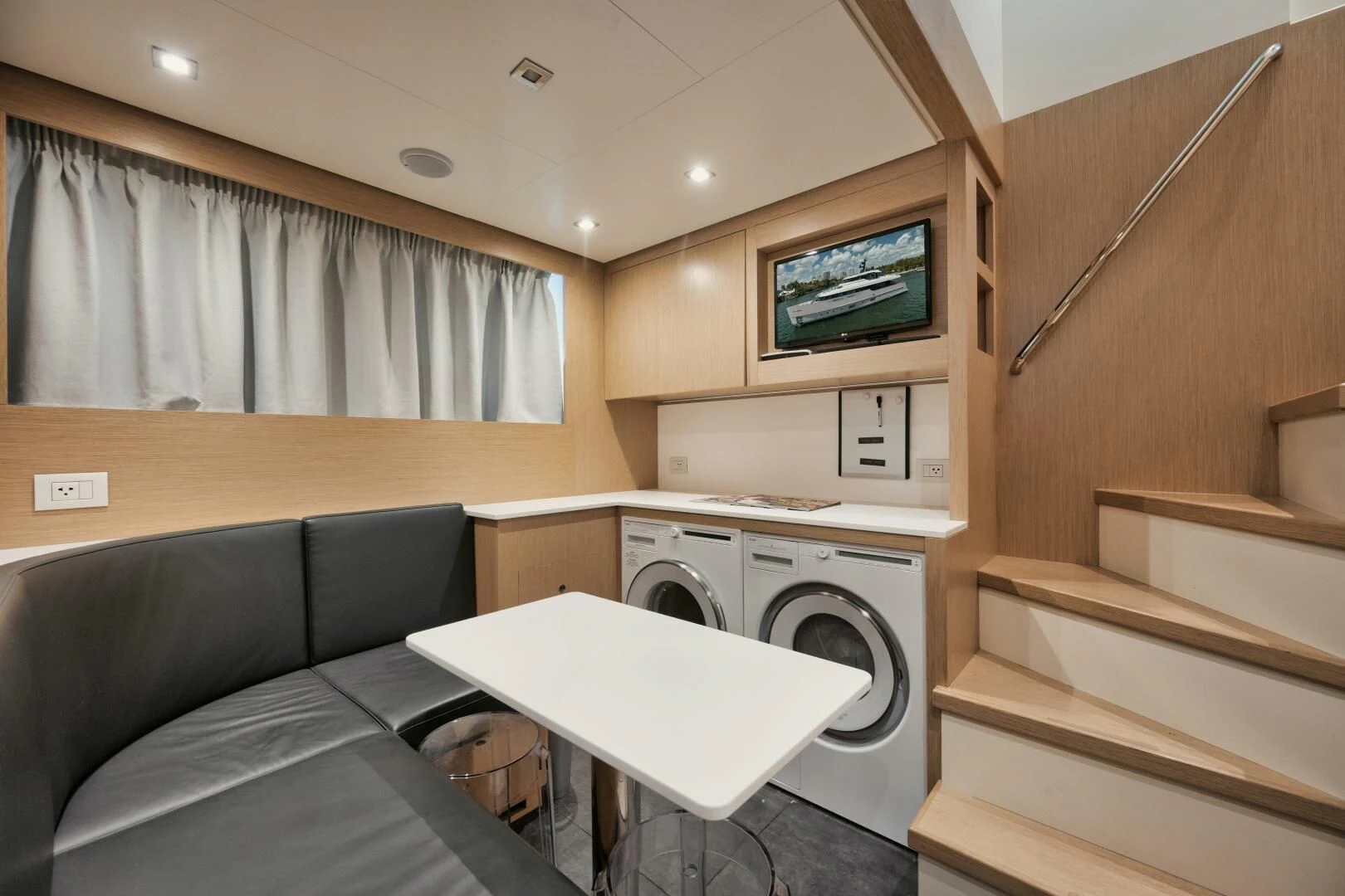 a living room with a couch and a bed aboard DON'T TELL MOM Yacht for Sale