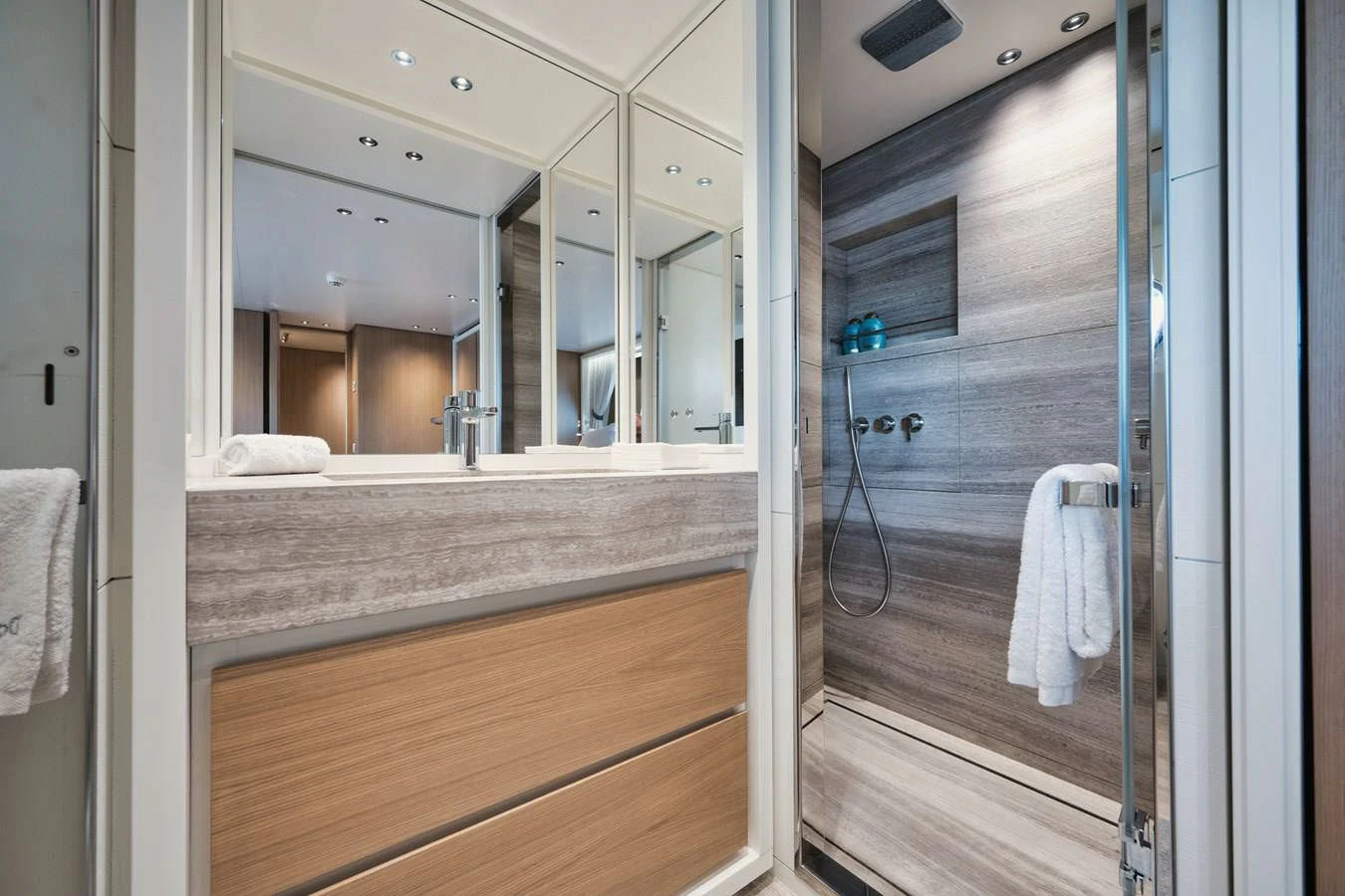 a bathroom with a large mirror aboard DON'T TELL MOM Yacht for Sale