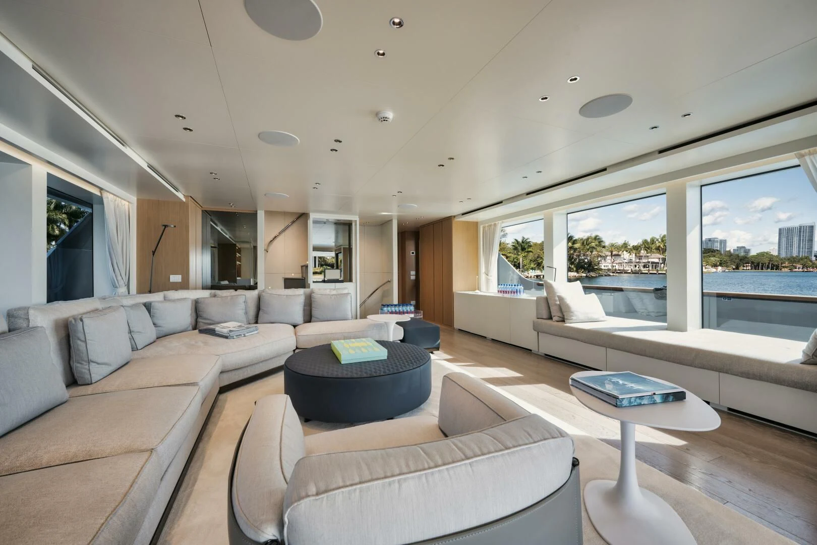 a living room with a large window aboard DON'T TELL MOM Yacht for Sale