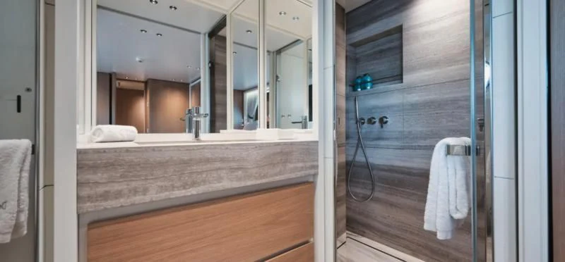 a bathroom with a large mirror aboard DON'T TELL MOM Yacht for Sale