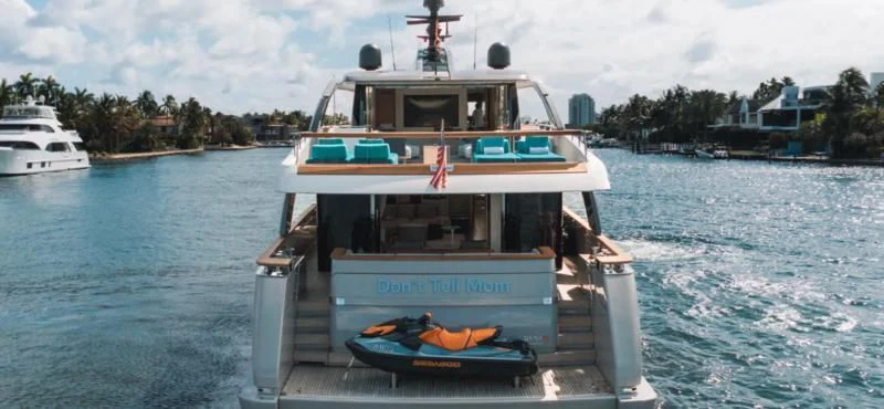 a boat on the water aboard DON'T TELL MOM Yacht for Sale