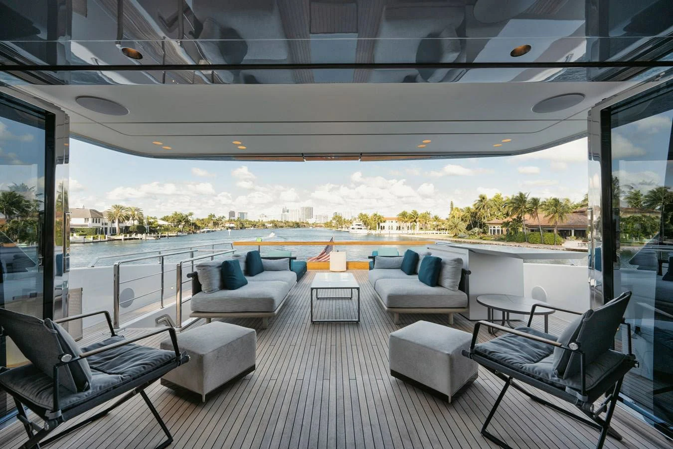 a large room with a view of the city aboard DON'T TELL MOM Yacht for Sale