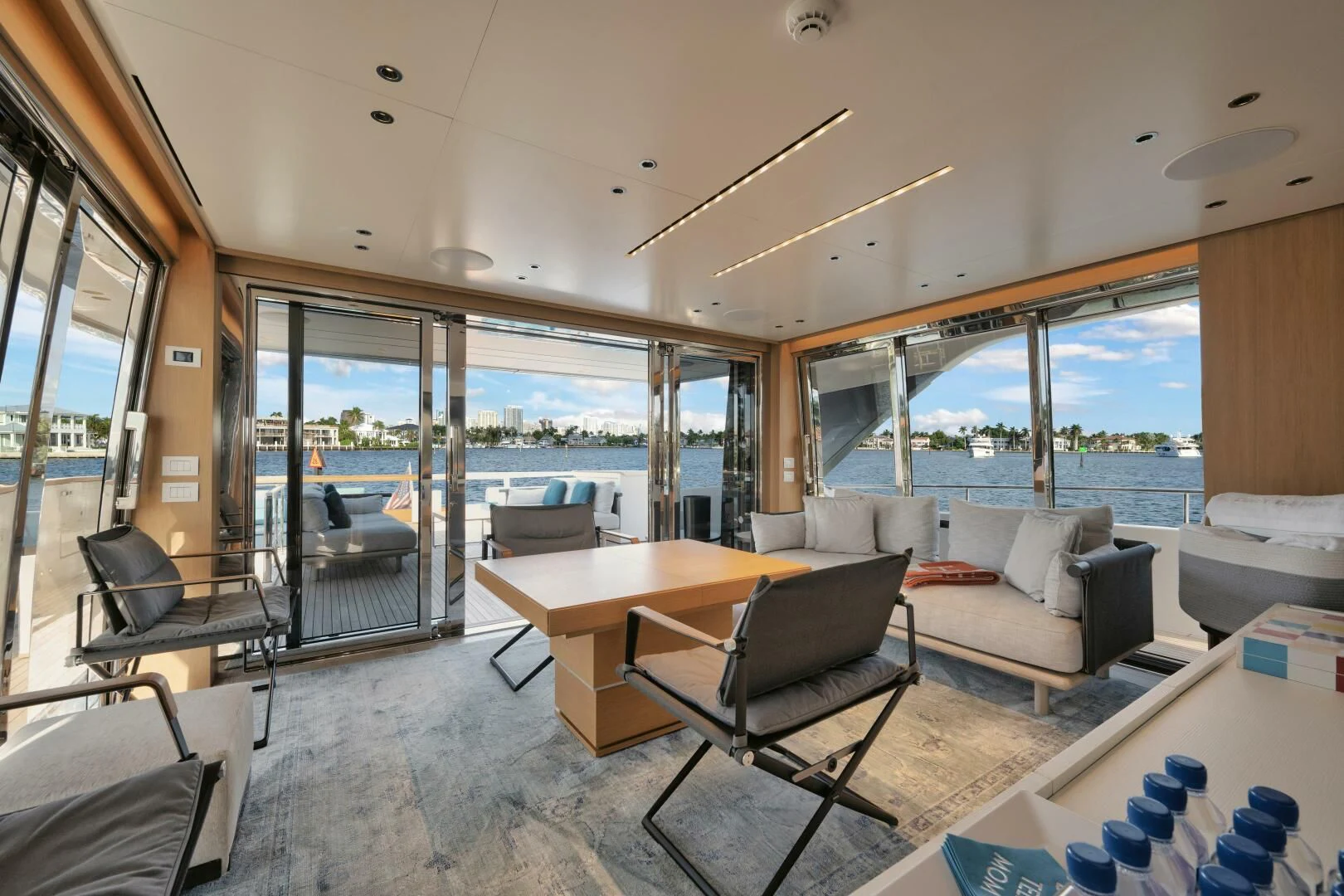 a living room with a large window aboard DON'T TELL MOM Yacht for Sale