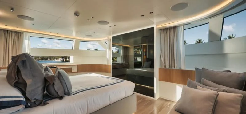 a room with a bed and a couch aboard DON'T TELL MOM Yacht for Sale